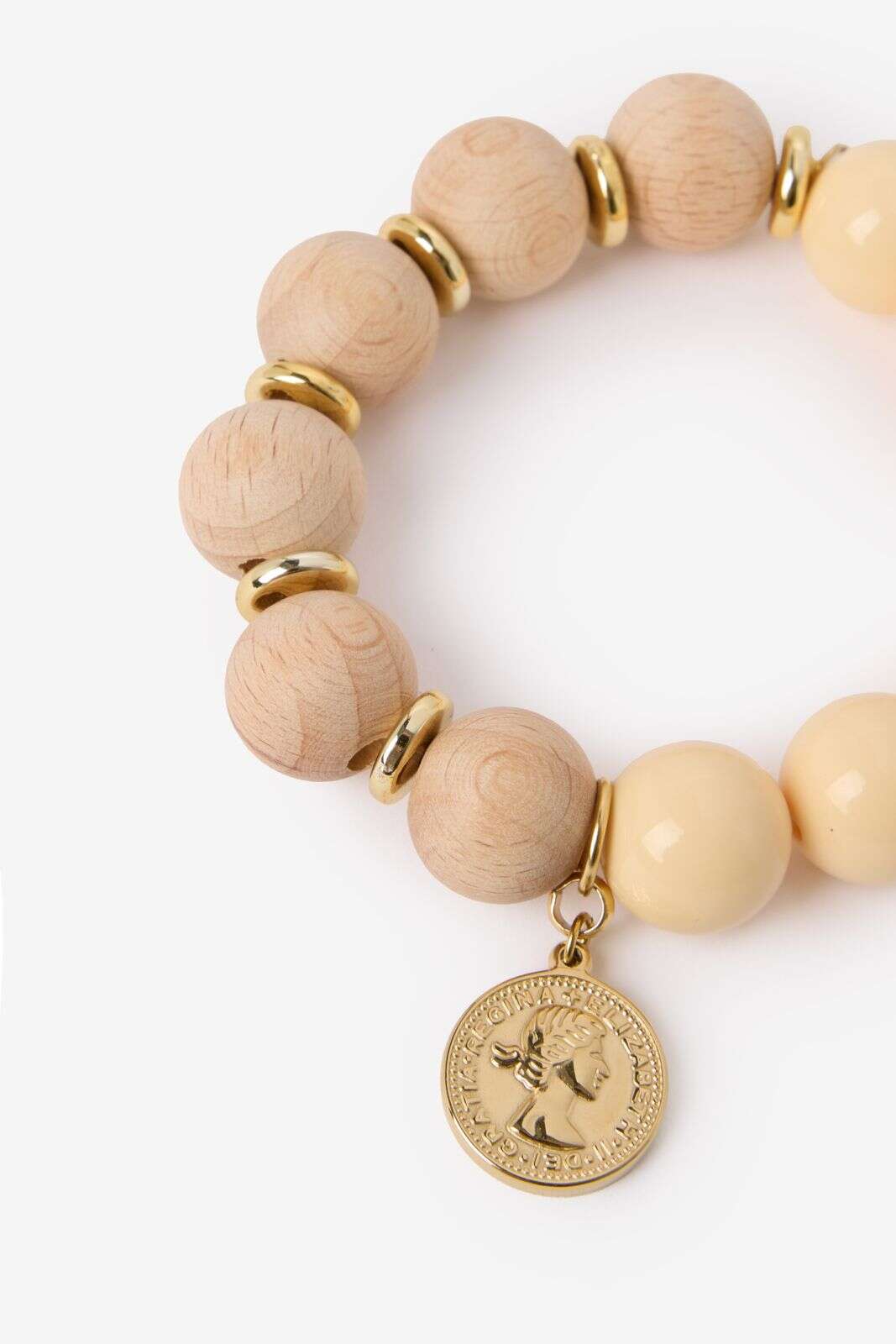 Beige kralen armband met munt