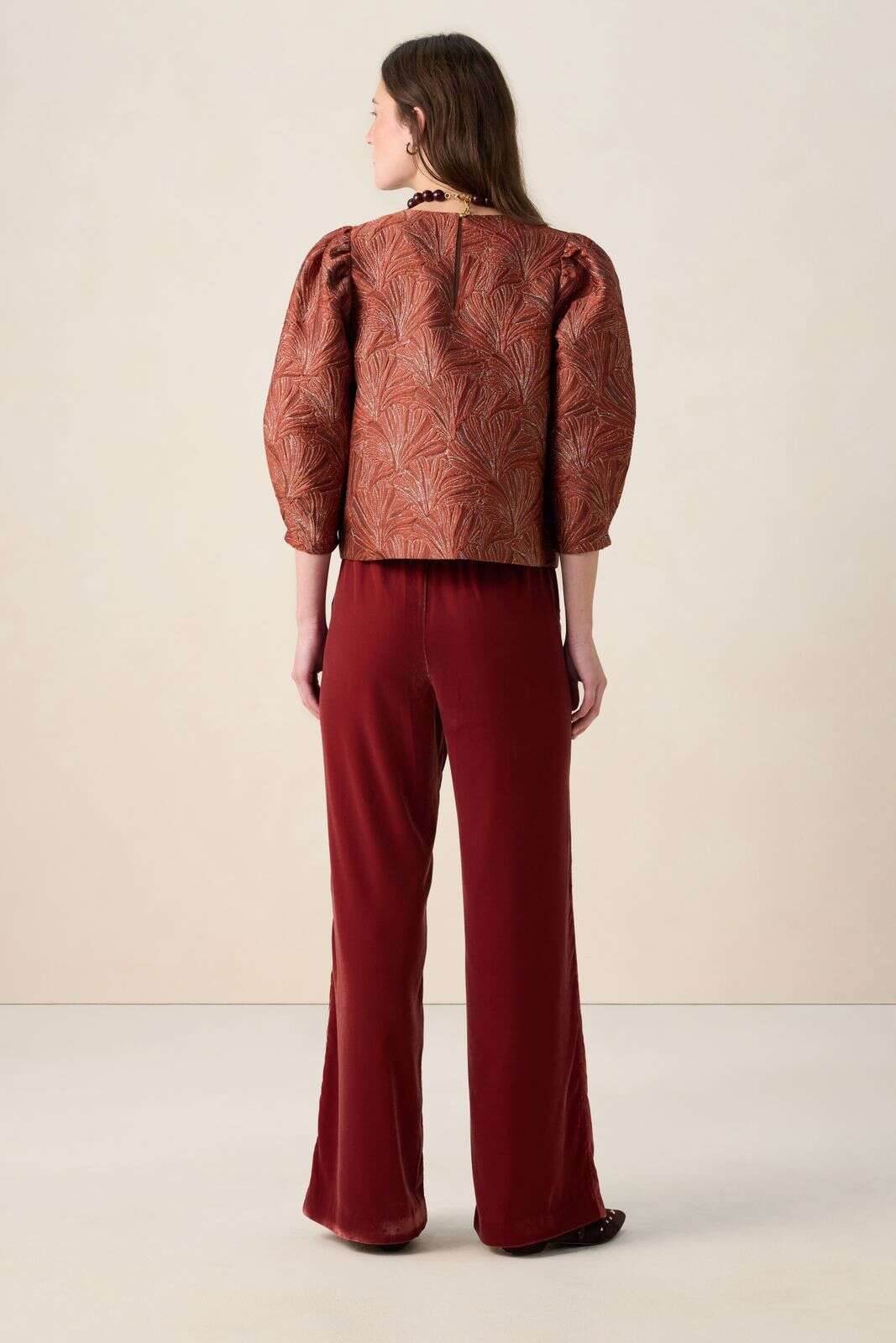 Lichtbruine top met ballonmouwen