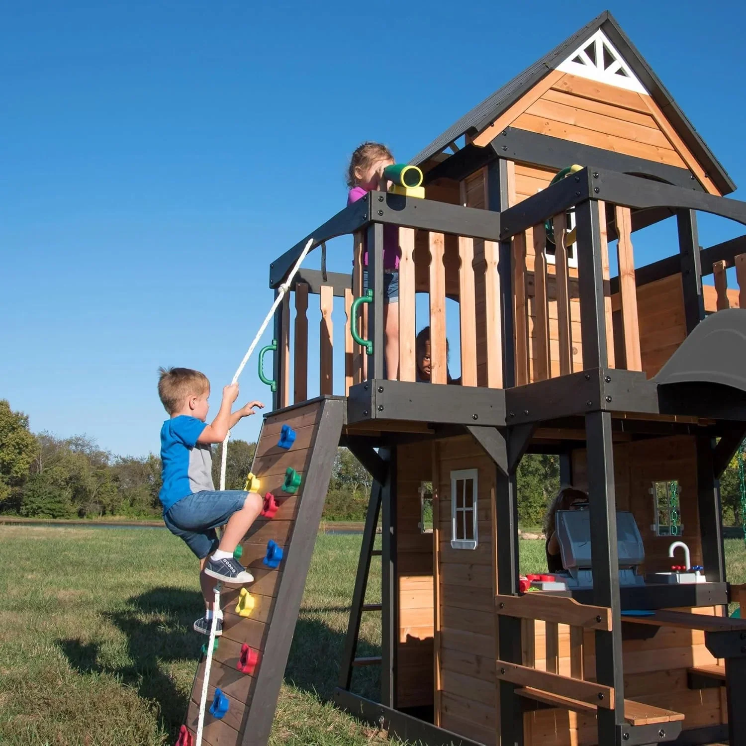 Canyon Creek Cedar Wood Swing Set with Wave Slide, Clubhouse, Play Kitchen, Picnic Area, Belt Swings, Web Swing, Rock Wall, Balconies,…
