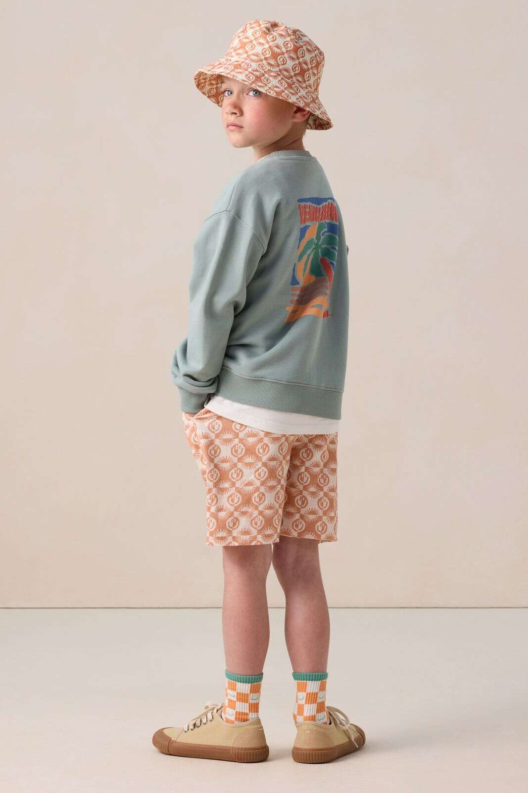Oranje shorts met smiley print