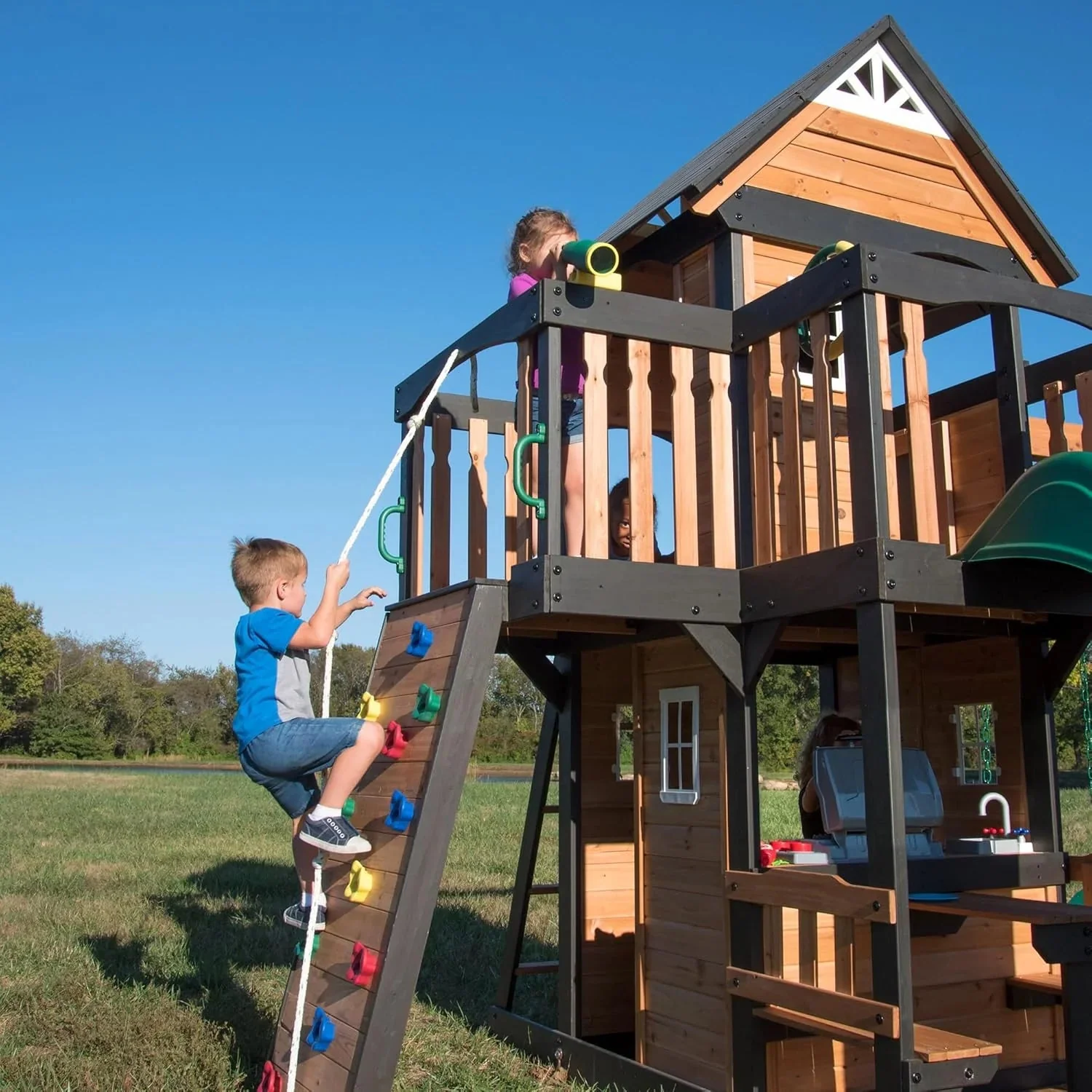 Canyon Creek Cedar Wood Swing Set with Wave Slide, Clubhouse, Play Kitchen, Picnic Area, Belt Swings, Web Swing, Rock Wall, Balconies,…