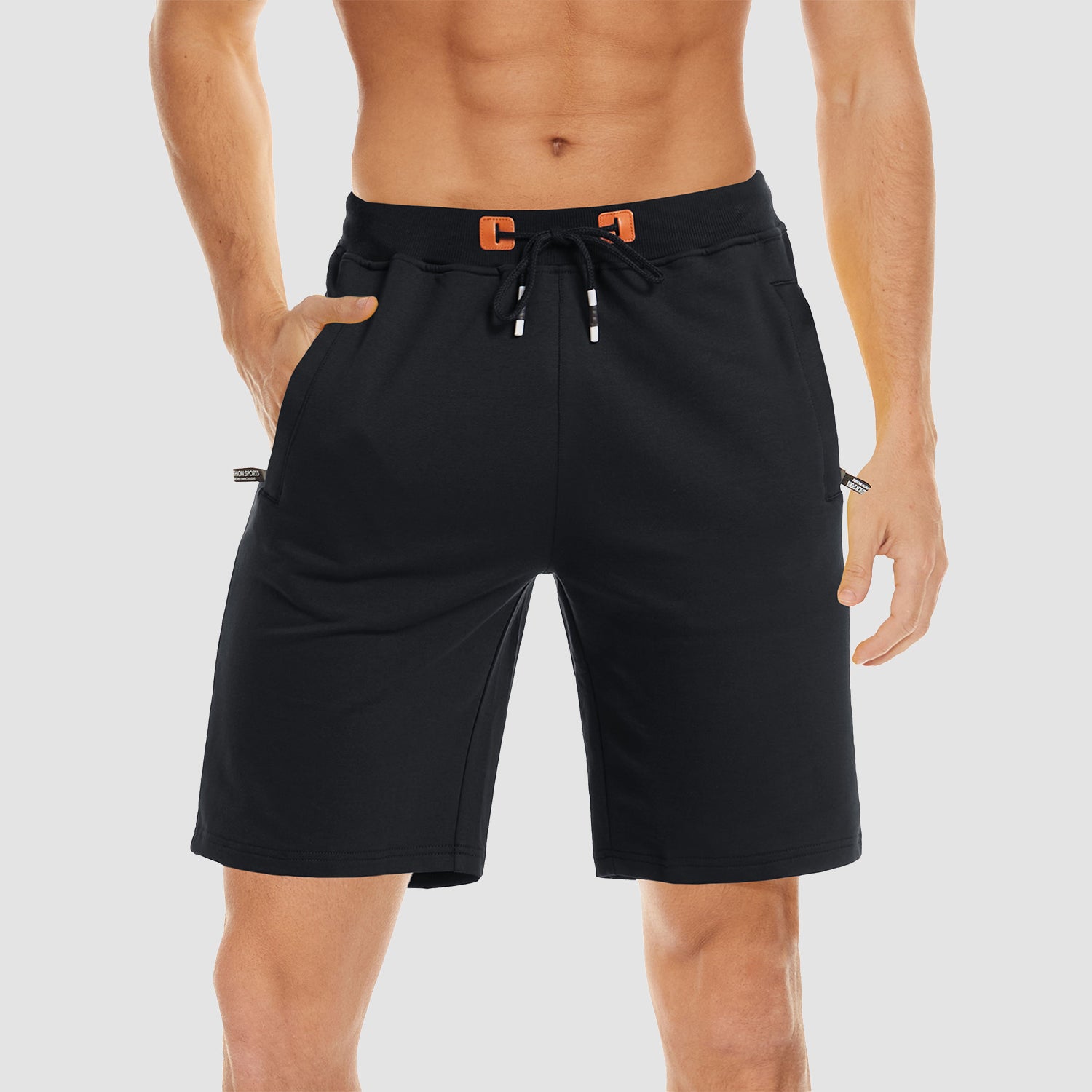 Short de sport en coton pour homme, idéal pour la course, la gym et le fitness. Taille élastique, poches zippées et cordon de serrage.