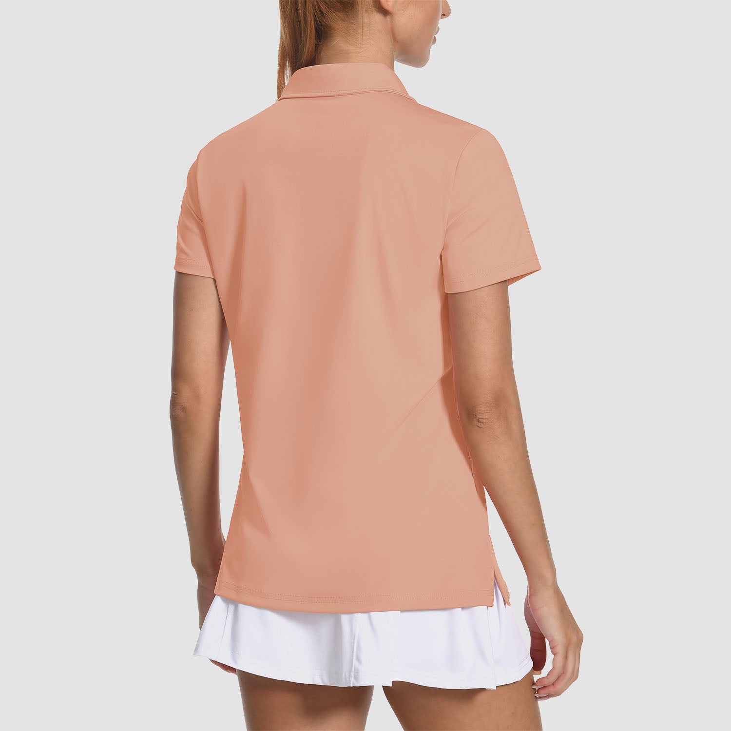 Polo de golf femme à col en V, protection solaire UPF 50+, léger et à séchage rapide.