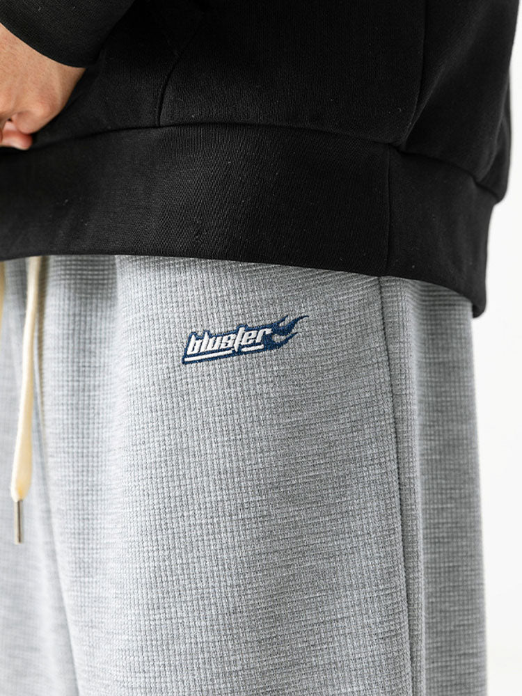 Joggers gaufrés brodés de lettres