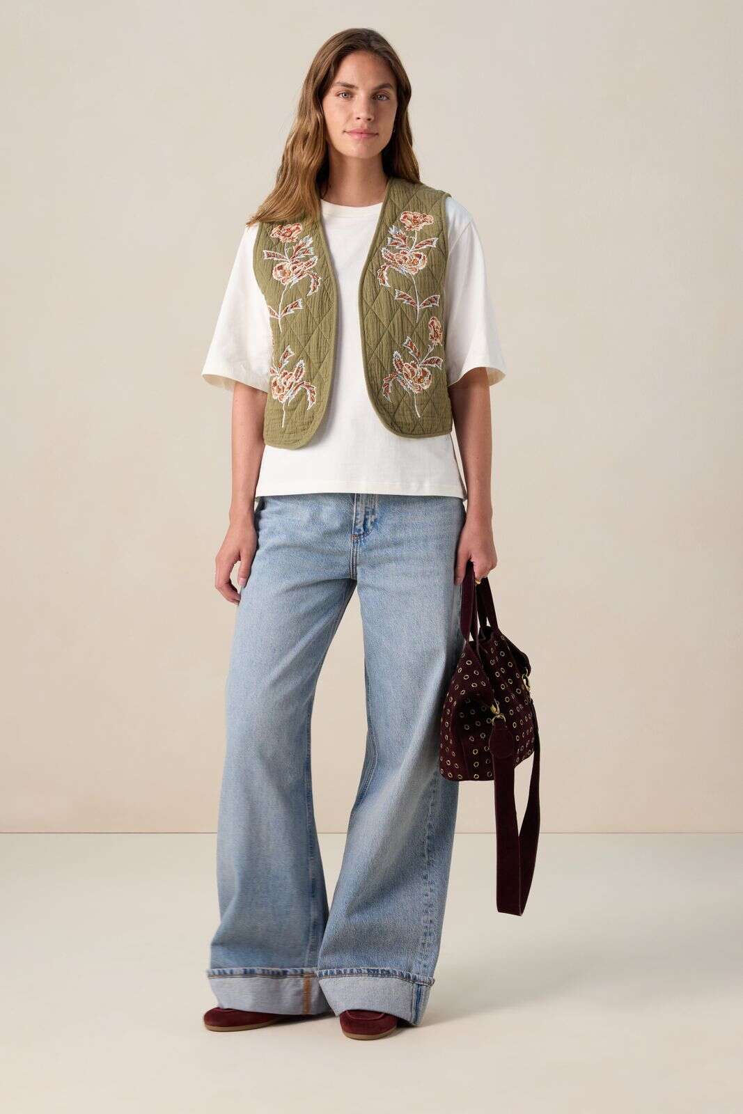 Donkergroen gilet met embroidery