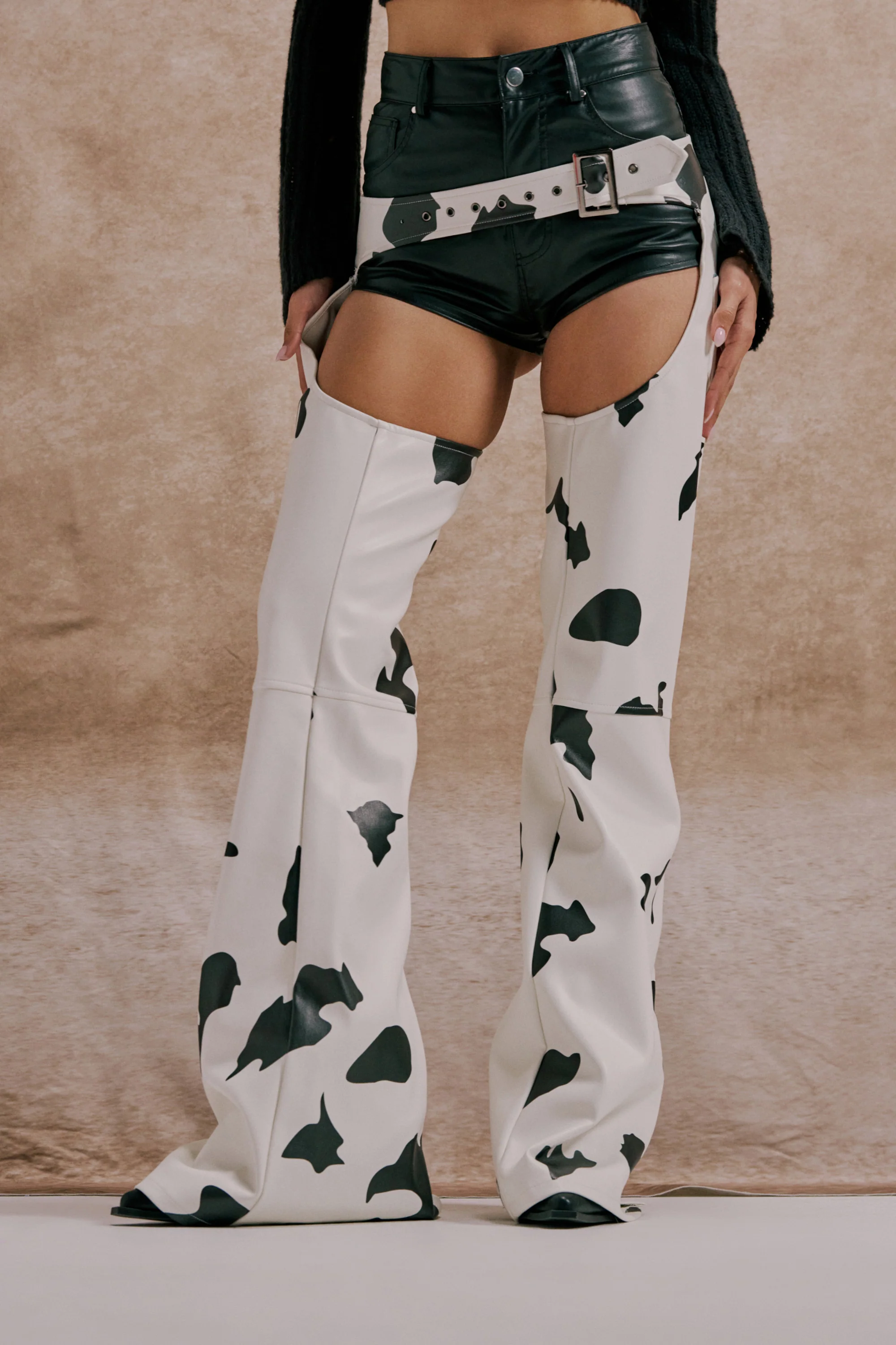 MOO OVER COW PRINT FAUX LEATHER CHAPS - Akira Store