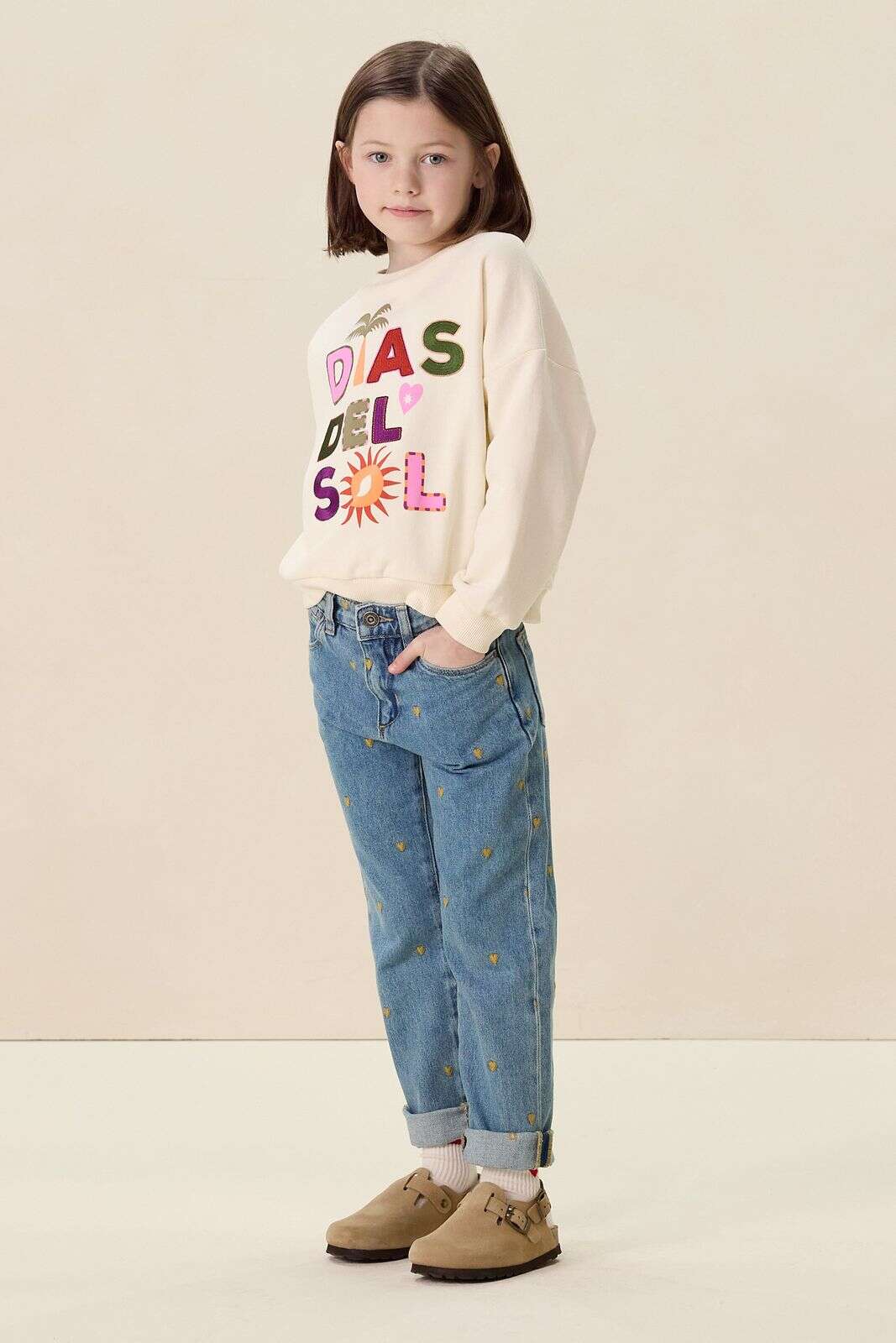 Blauwe tapered jeans met hartjes embroidery