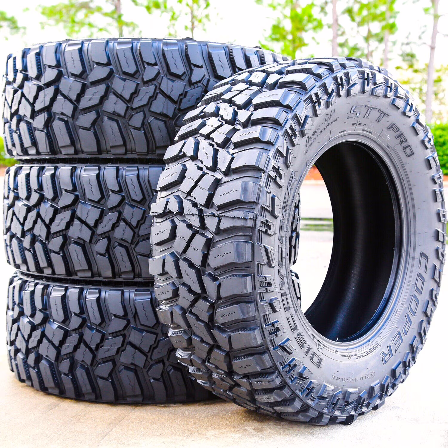 Set of 4 Cooper Discoverer STT Pro 275/65R20 126/123Q E 10 Ply M/T Mud Light Truck Tires