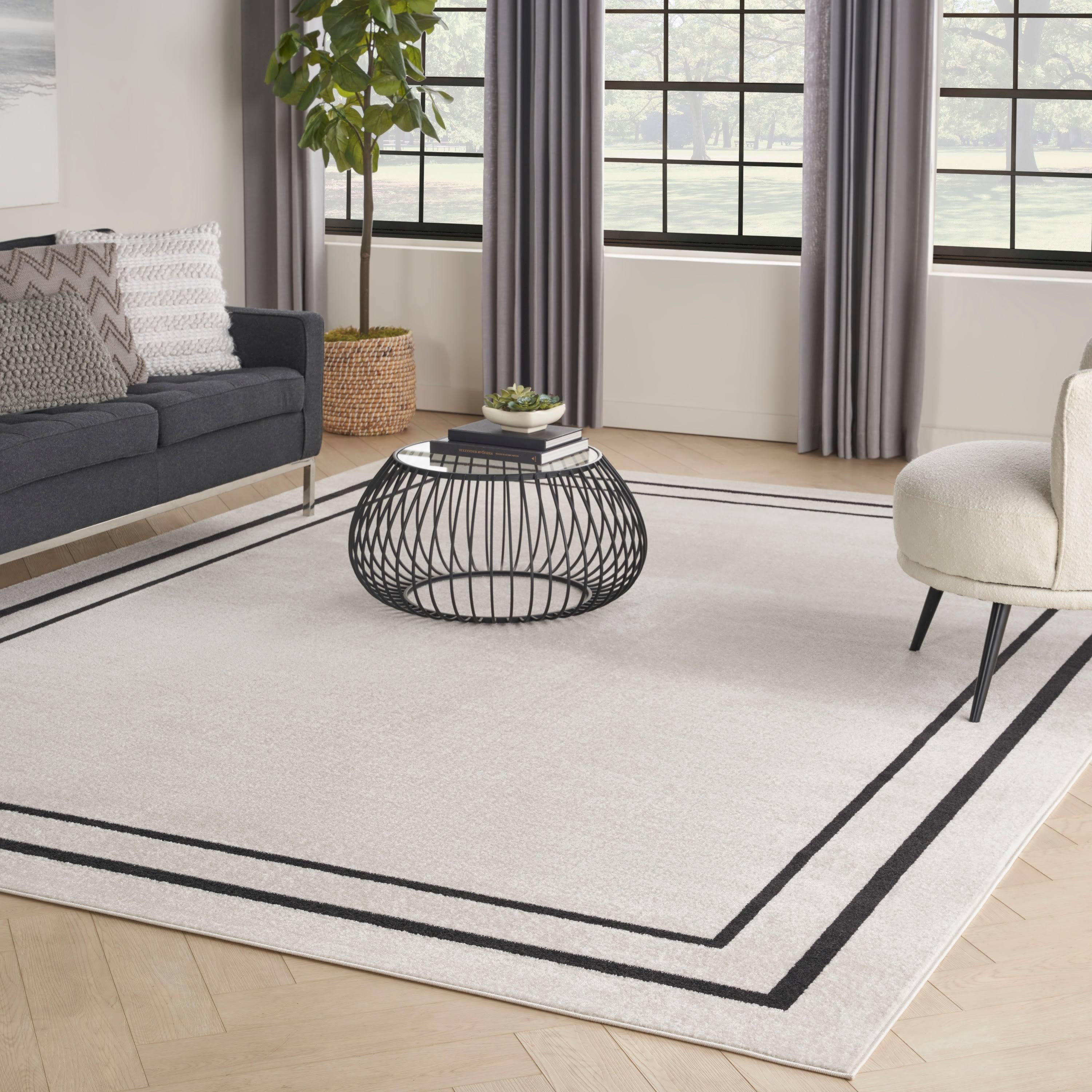 Nourison Sandy Indoor / Outdoor Solid Area Rug Ivory/Black 8'x10' 8' x 10' Blue Rectangle, Beige