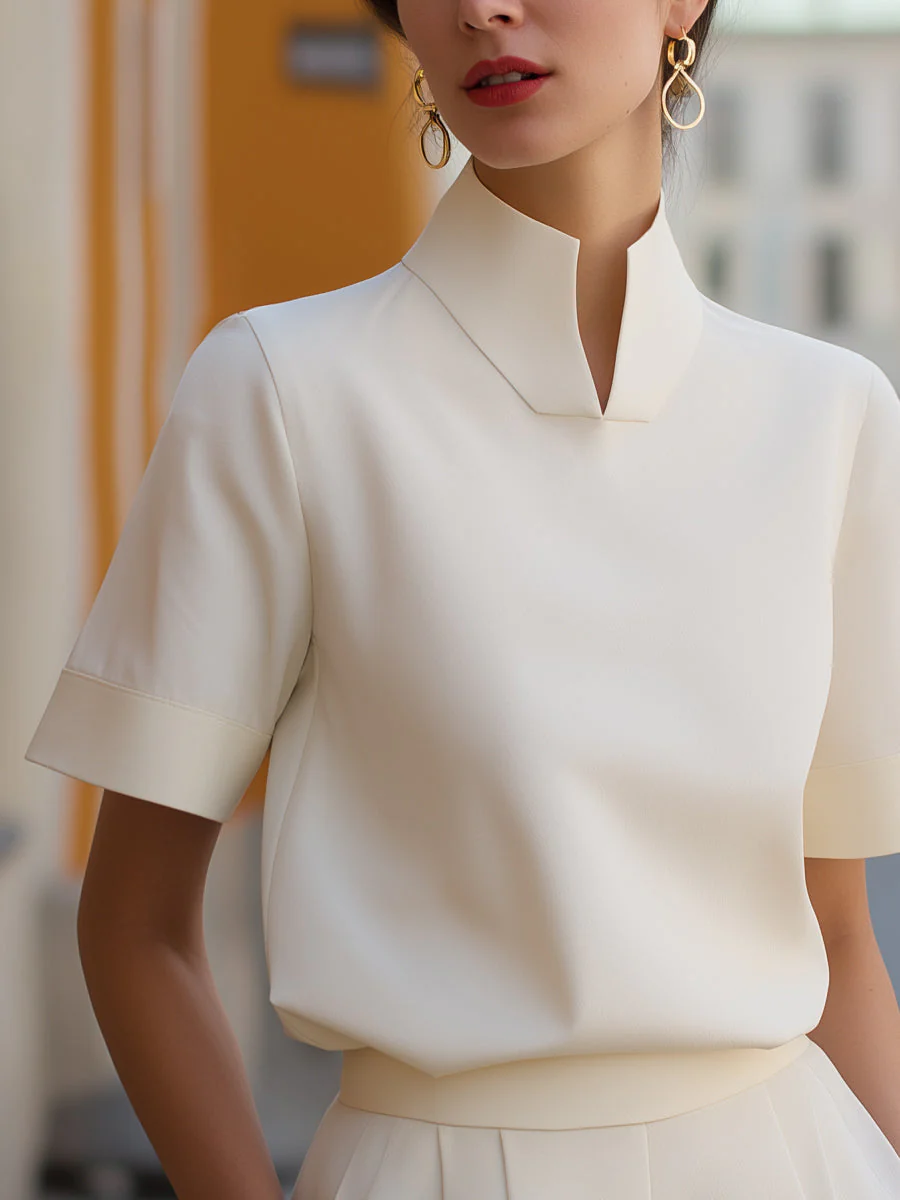 Blouse structurée minimaliste pour femmes à col montant