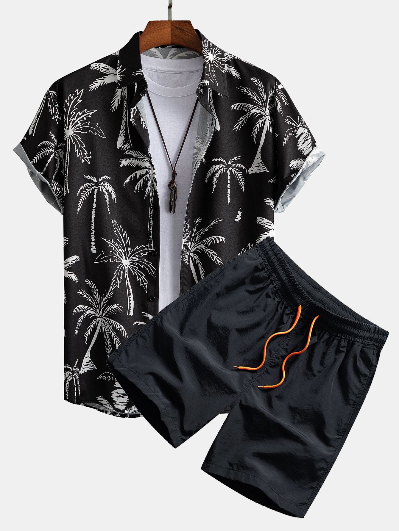 Chemise boutonnée à imprimé palmiers et short de bain