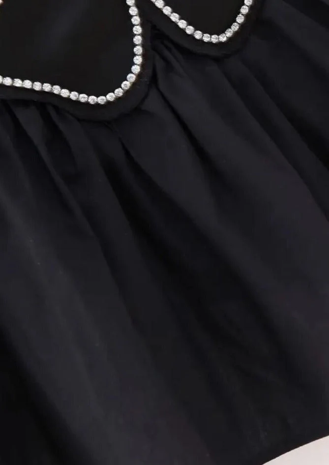 Haut noir en satin pour femme à col bénitier