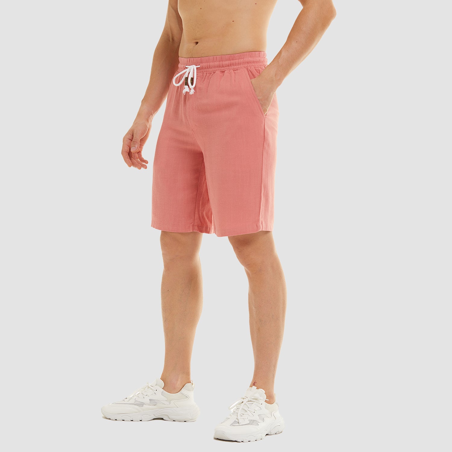 Short homme en lin et coton, couleur unie, taille élastiquée avec cordon de serrage.