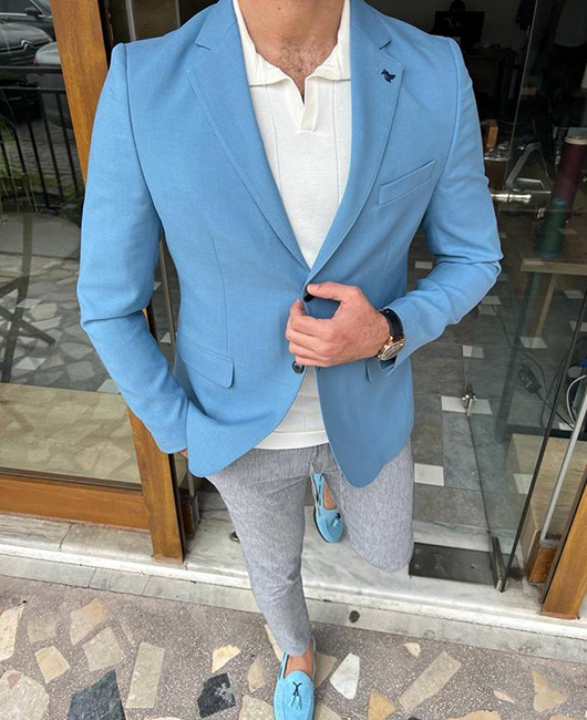 Blazer uni Daily à revers cranté et poches, à simple boutonnage.