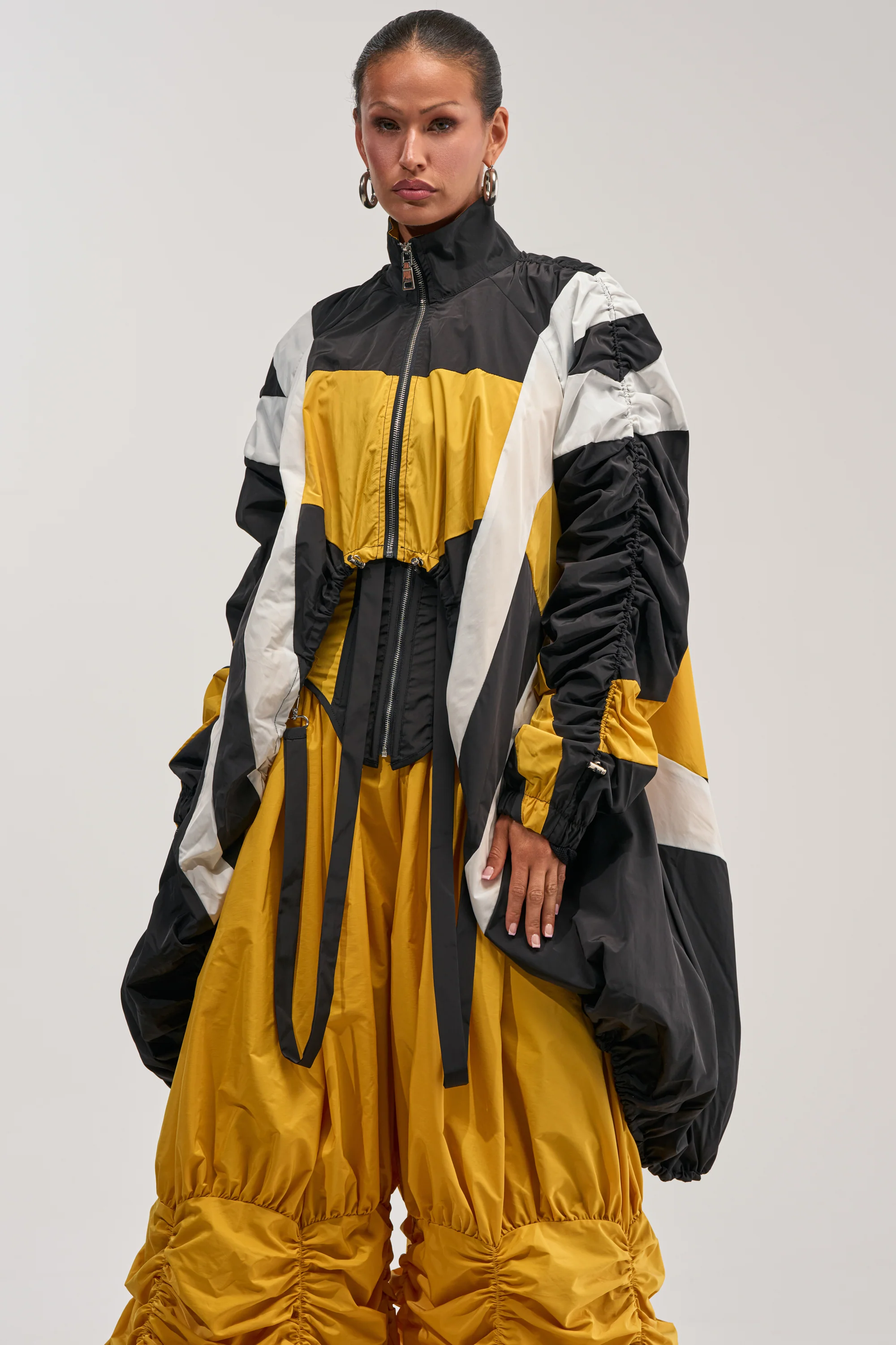 DON'T MIND ME HIGH LOW WINDBREAKER IN YELLOW - Akira Store