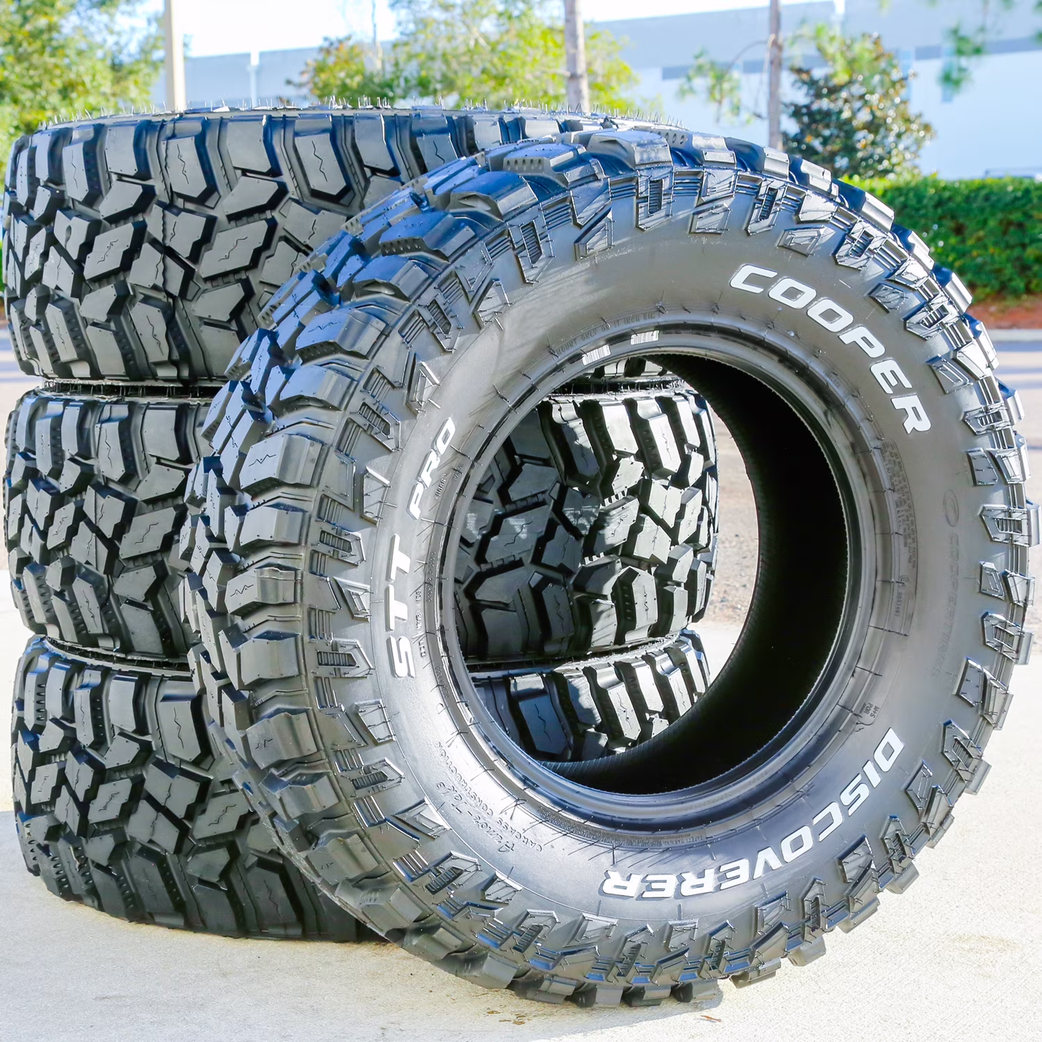Set of 4 Cooper Discoverer STT Pro 315/70R17 121/118Q E 10 Ply M/T Mud Light Truck Tires