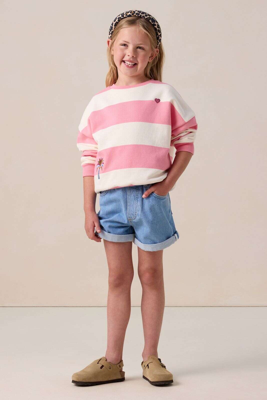 Lichtroze trui met strepen