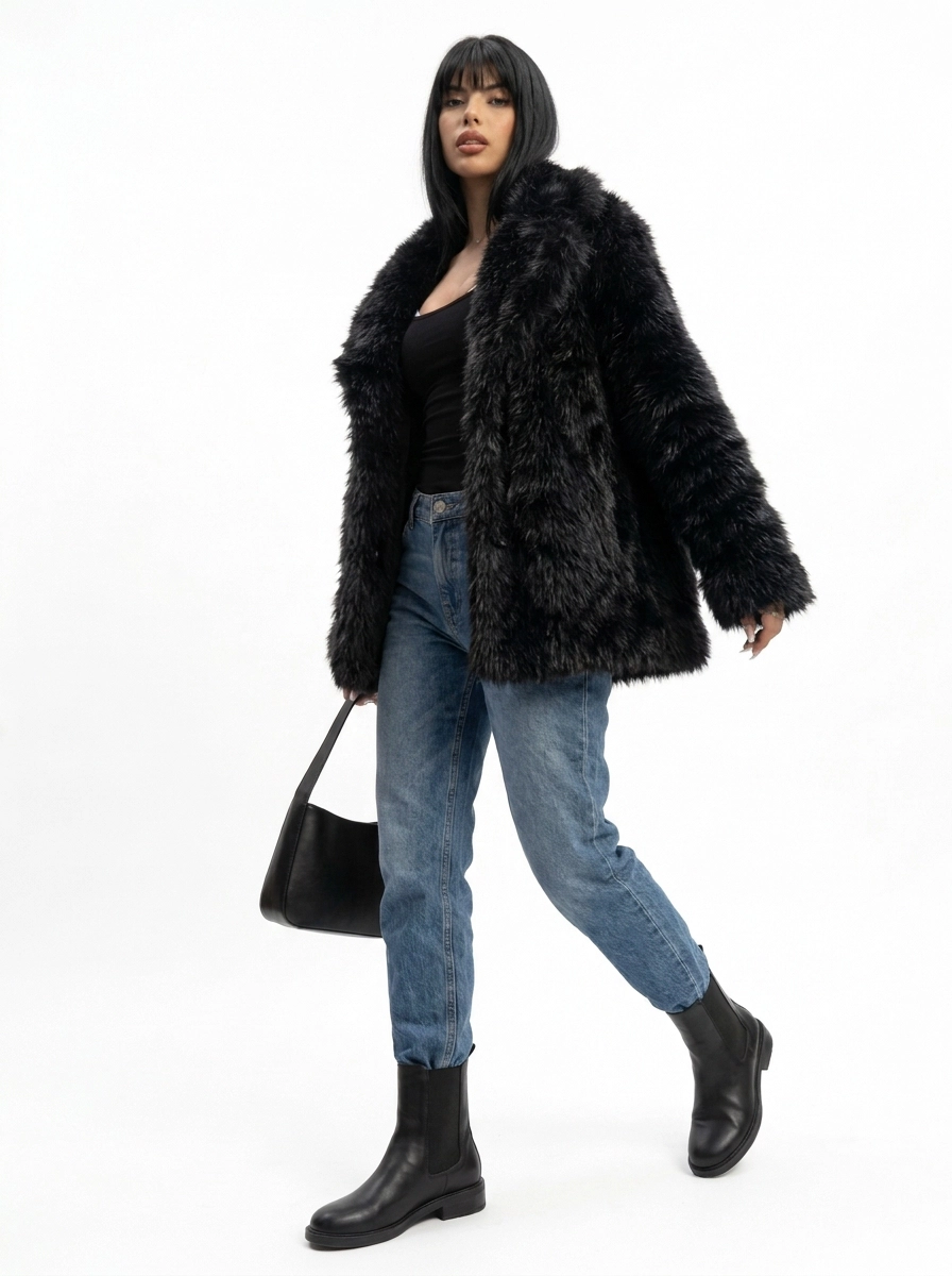Full-length view of a woman wearing a black faux fur coat