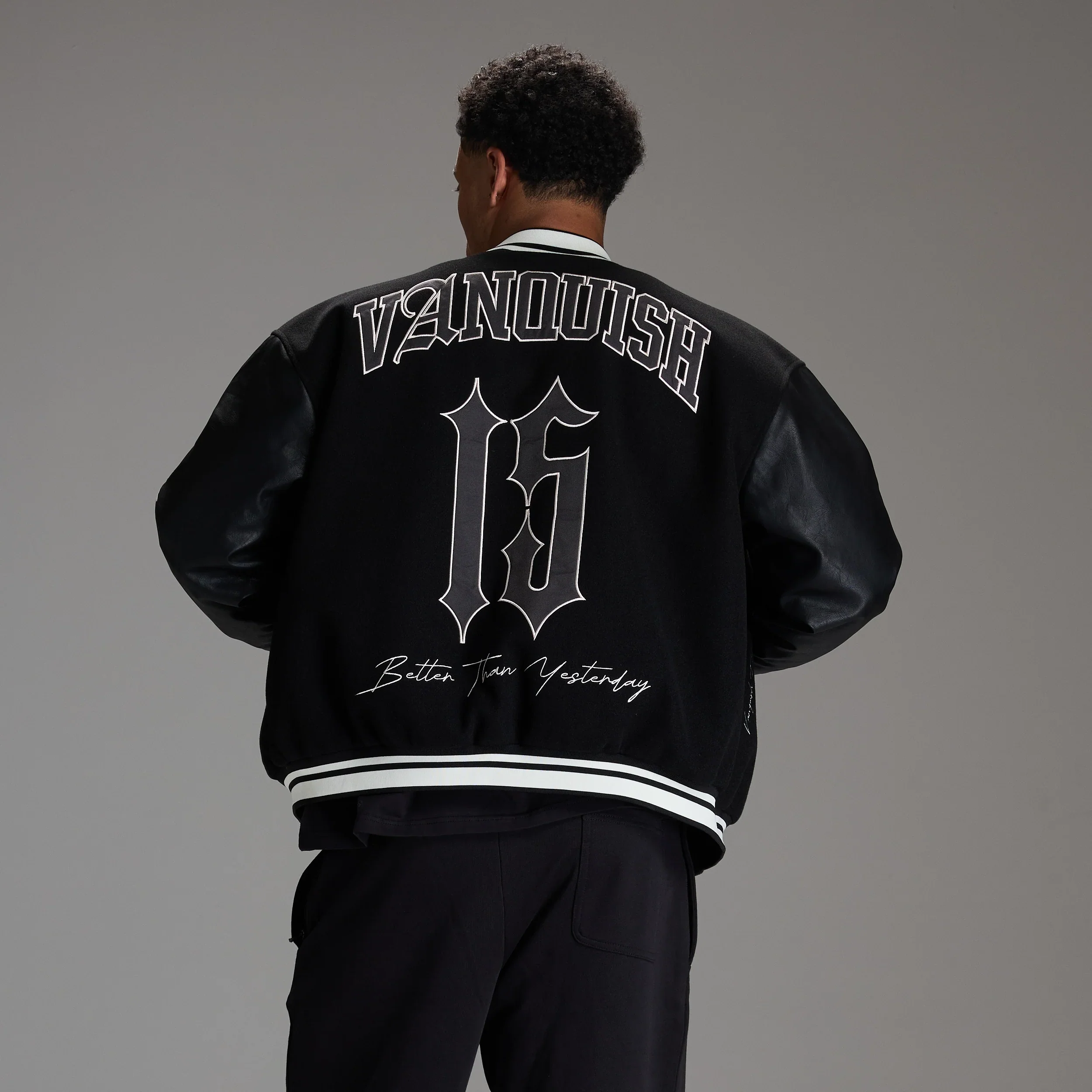 VARSITY BLACK OVERSIZED BOMBER JACKET