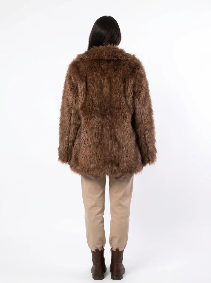 Back view of a women's light brown faux fur coat