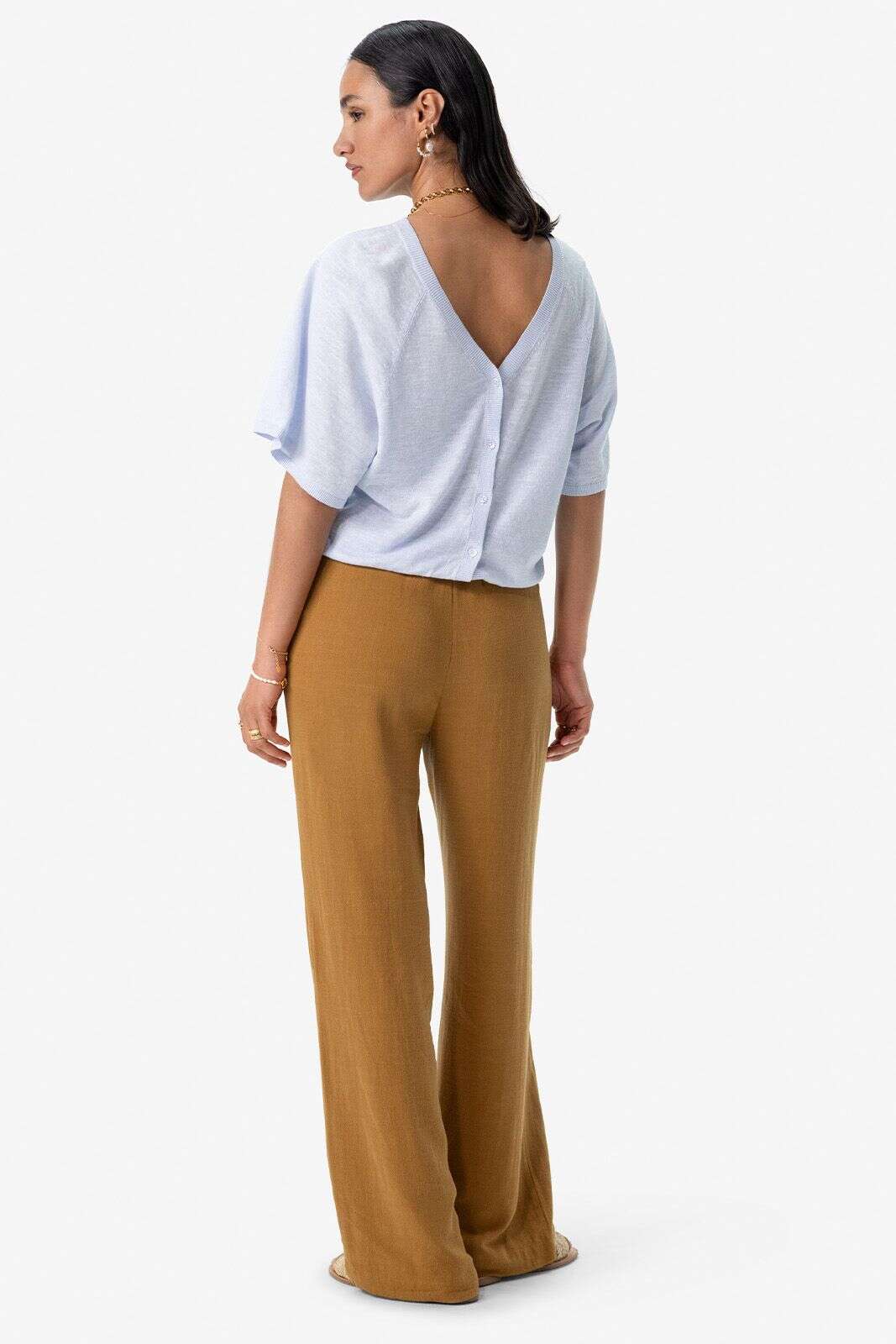 Lichtblauwe trui met knopen