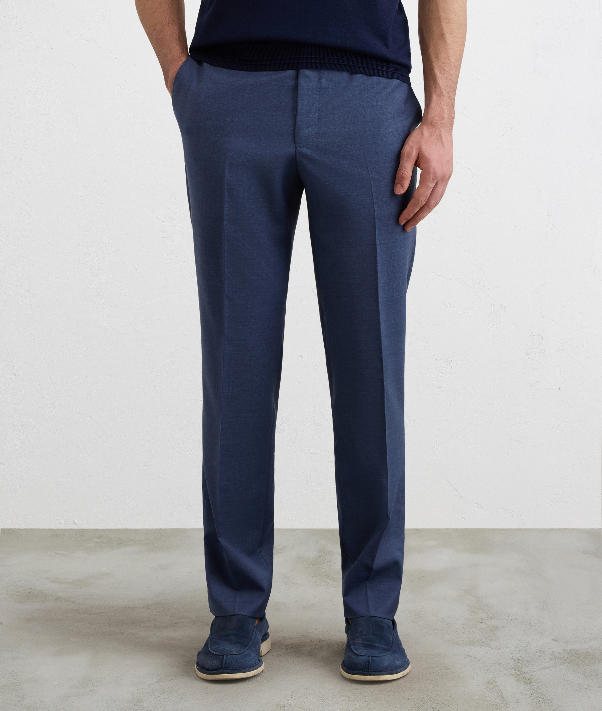 TROUSERS IN VIRGIN WOOL AND ELASTANE IN A SOLID BLUE MELANGE COLOR