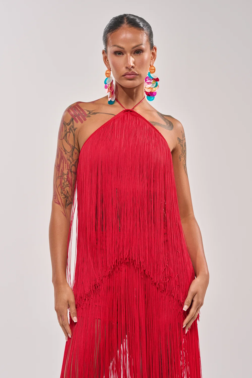 ON THE EDGE FRINGE HALTER TOP - Akira Store