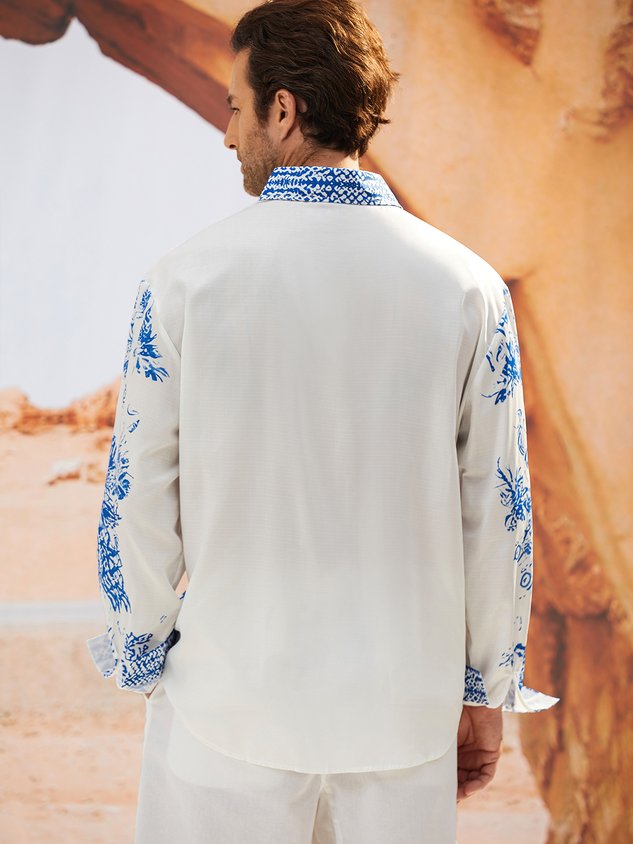 Chemise à manches longues avec poche poitrine contrastée à motif floral