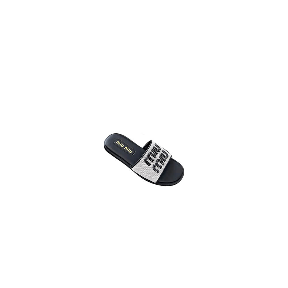 MiuMiu Canvas and leather slides