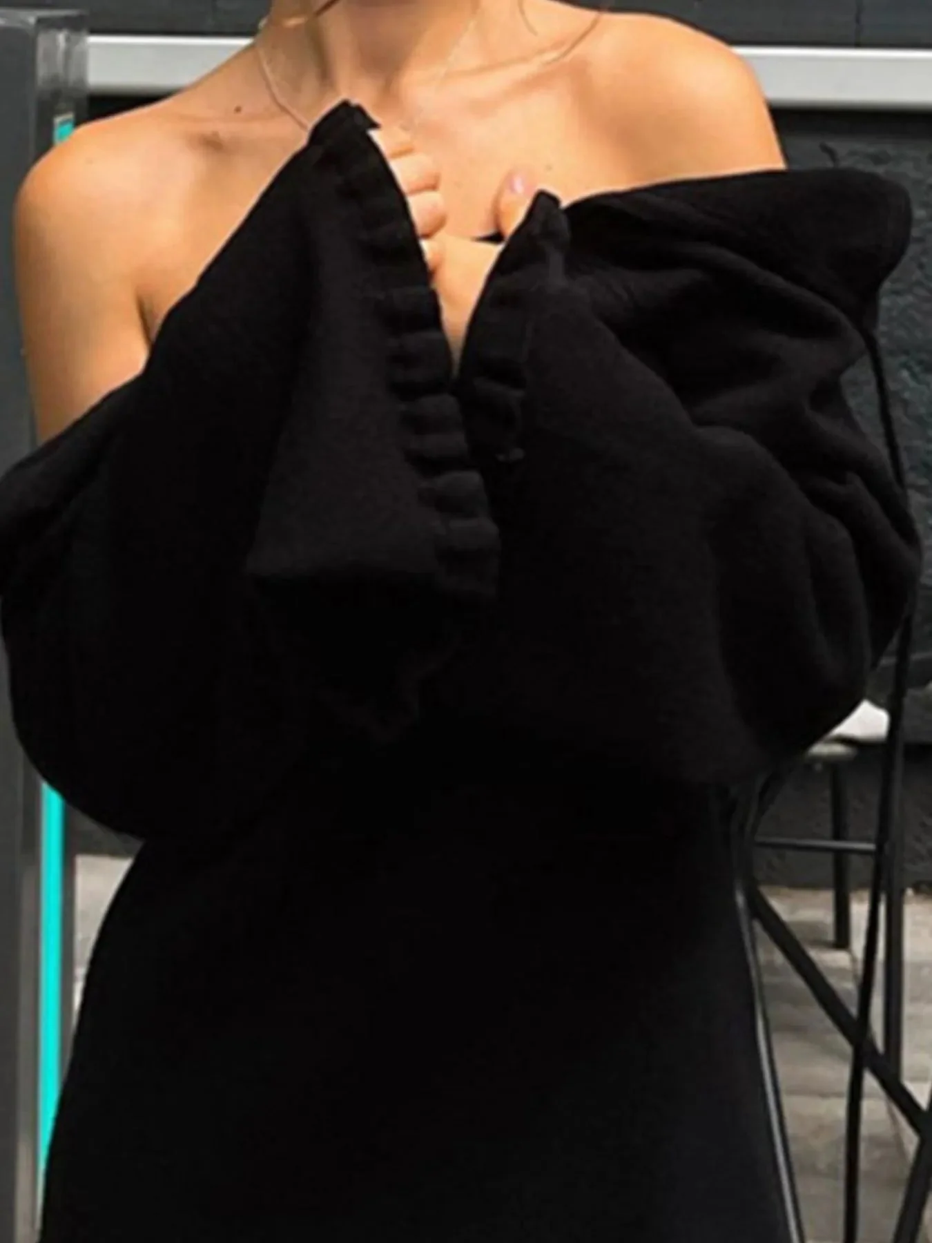 Robe pull en maille à manches longues et dos nu