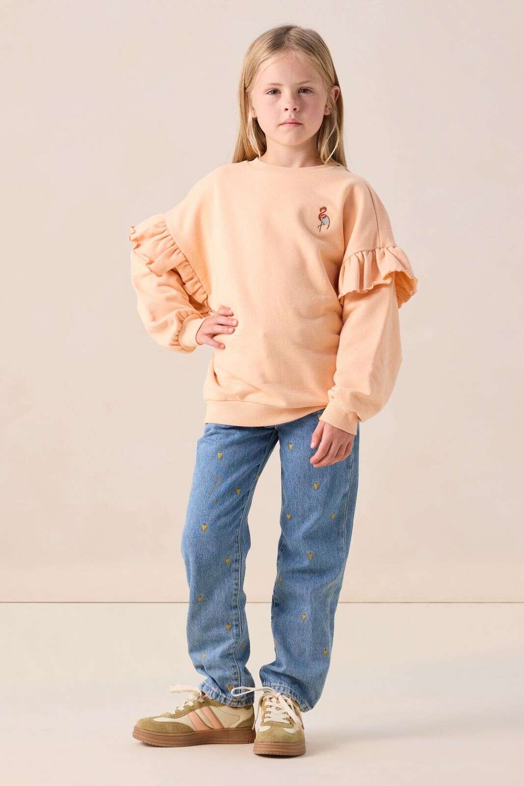 Lichtoranje ruffle sweater