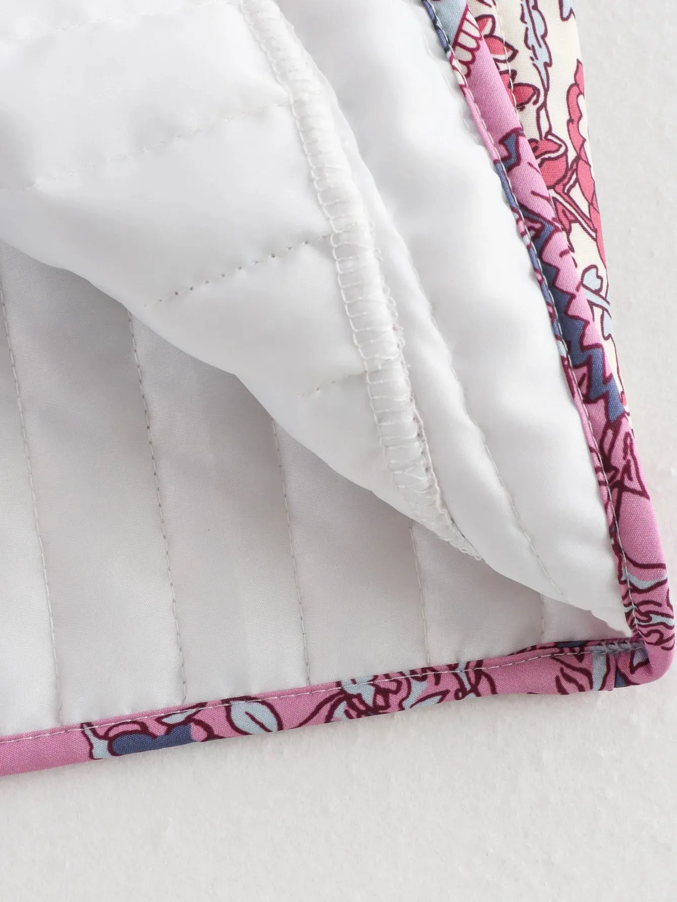 Sophie Paris I Gilet en coton matelassé avec motif brodé