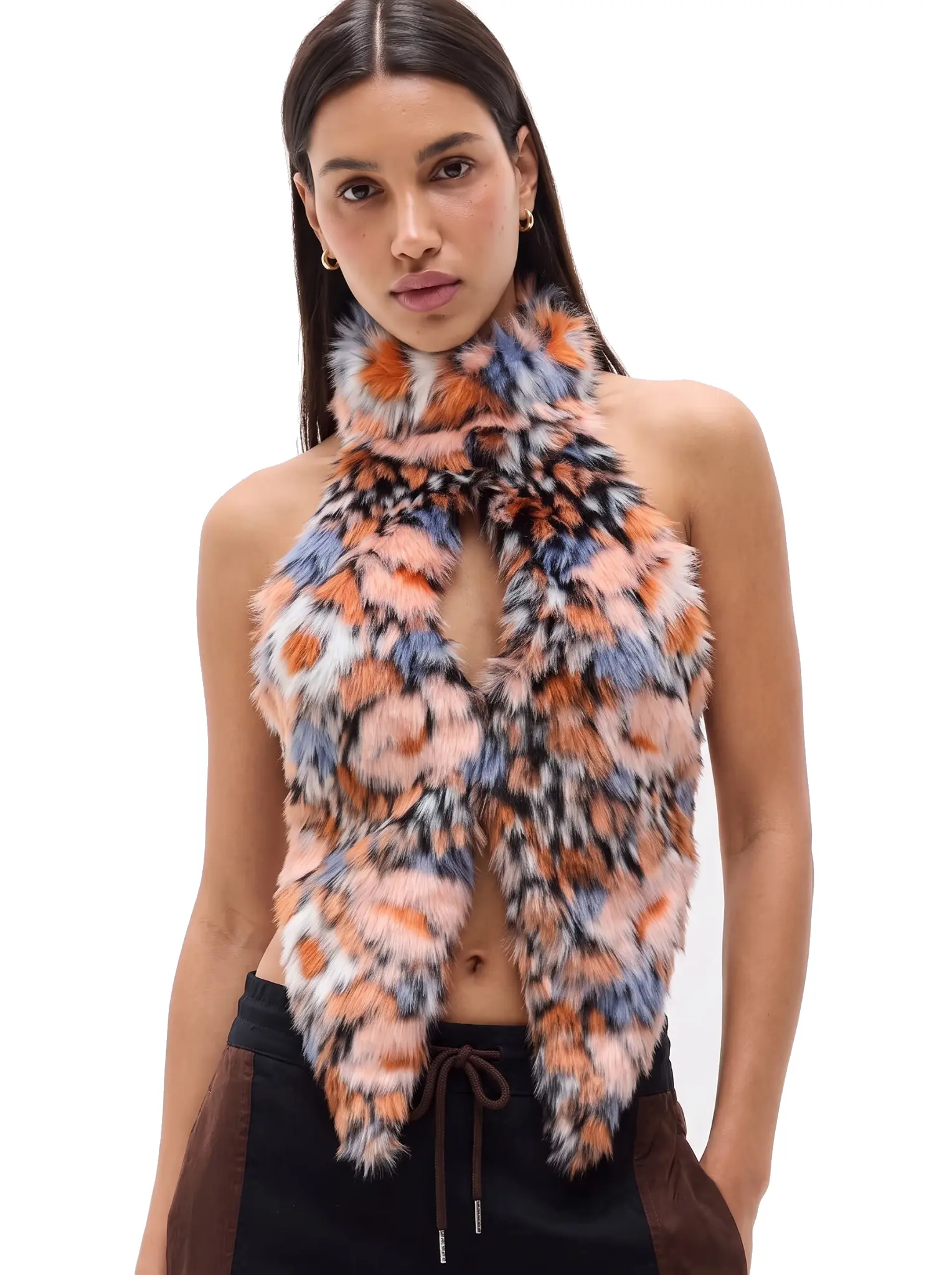 Front view of a woman wearing an orange and blue spotted faux fur halter vest