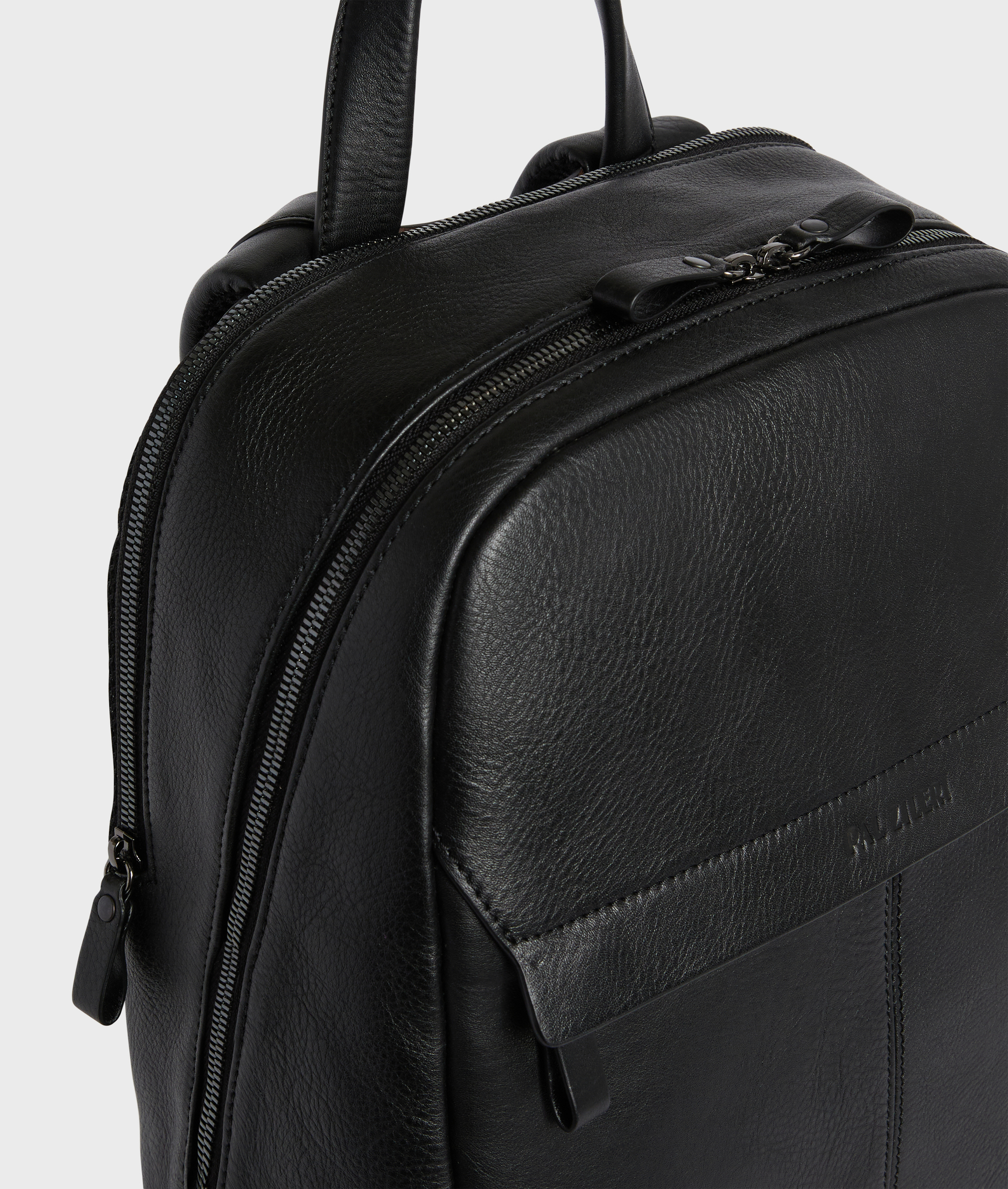 BLACK VEGETABLE TANNED CALFSKIN BACKPACK WITH FRONT ZIP POCKET