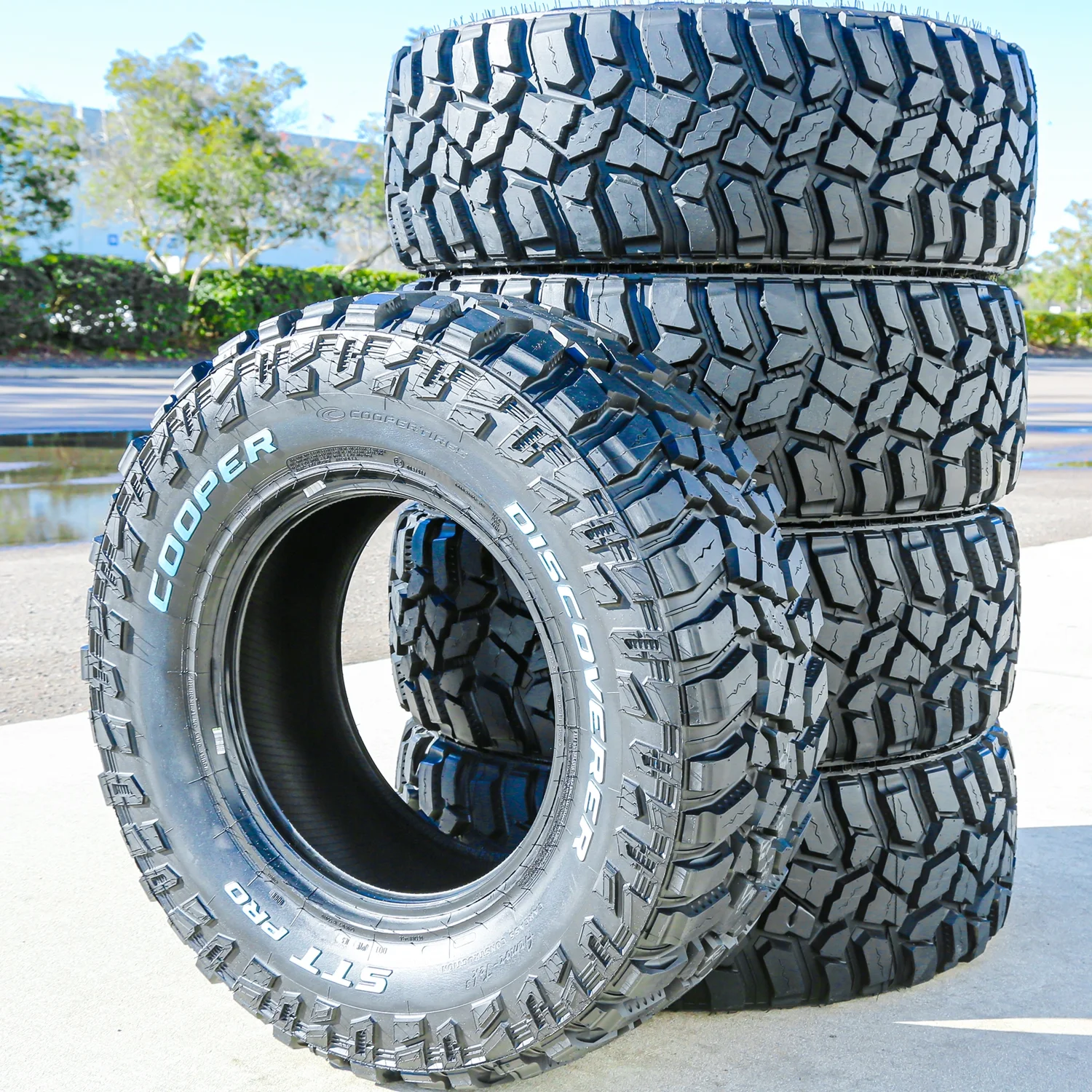 Set of 4 Cooper Discoverer STT Pro 315/70R17 121/118Q E 10 Ply M/T Mud Light Truck Tires