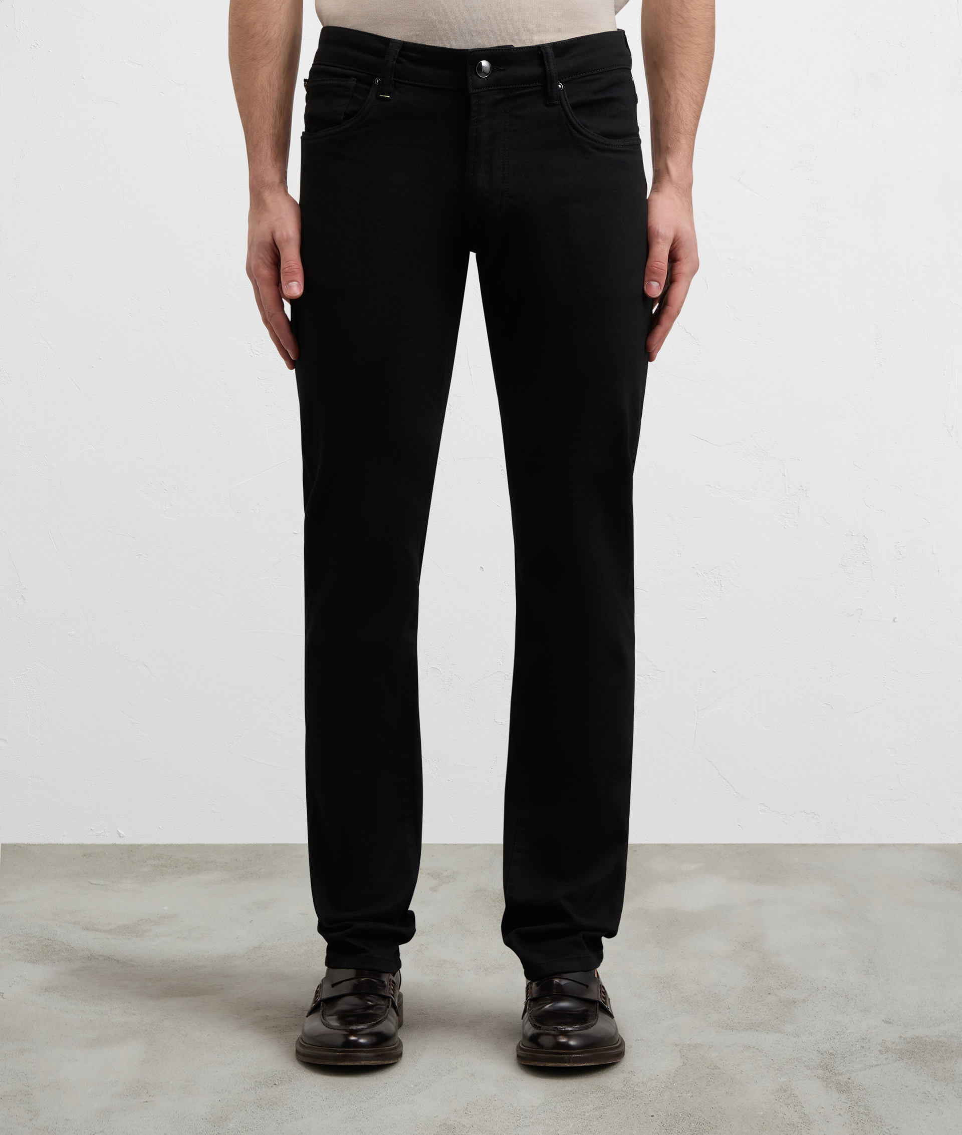 BLACK COTTON AND ELASTANE DENIM WITH LEATHER BADGE AND METAL LOGO