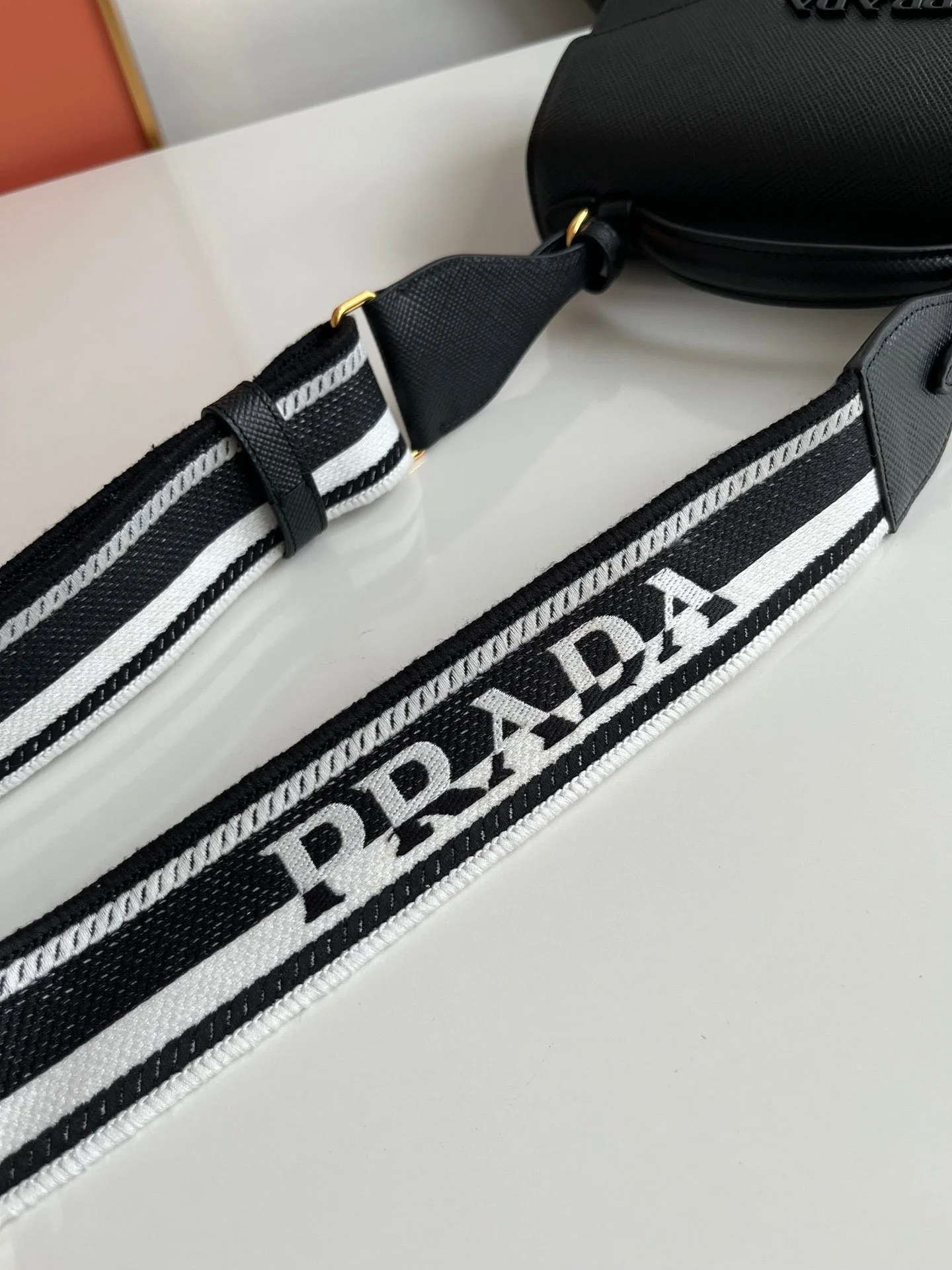 Prada Monochrome Saffiano 21 Leather Bag in Black 21x14x6.5cm