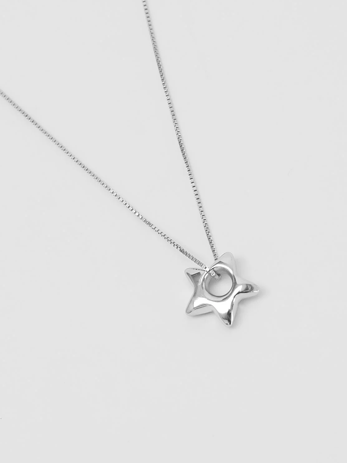 Star Charm Necklace in Sterling Silver