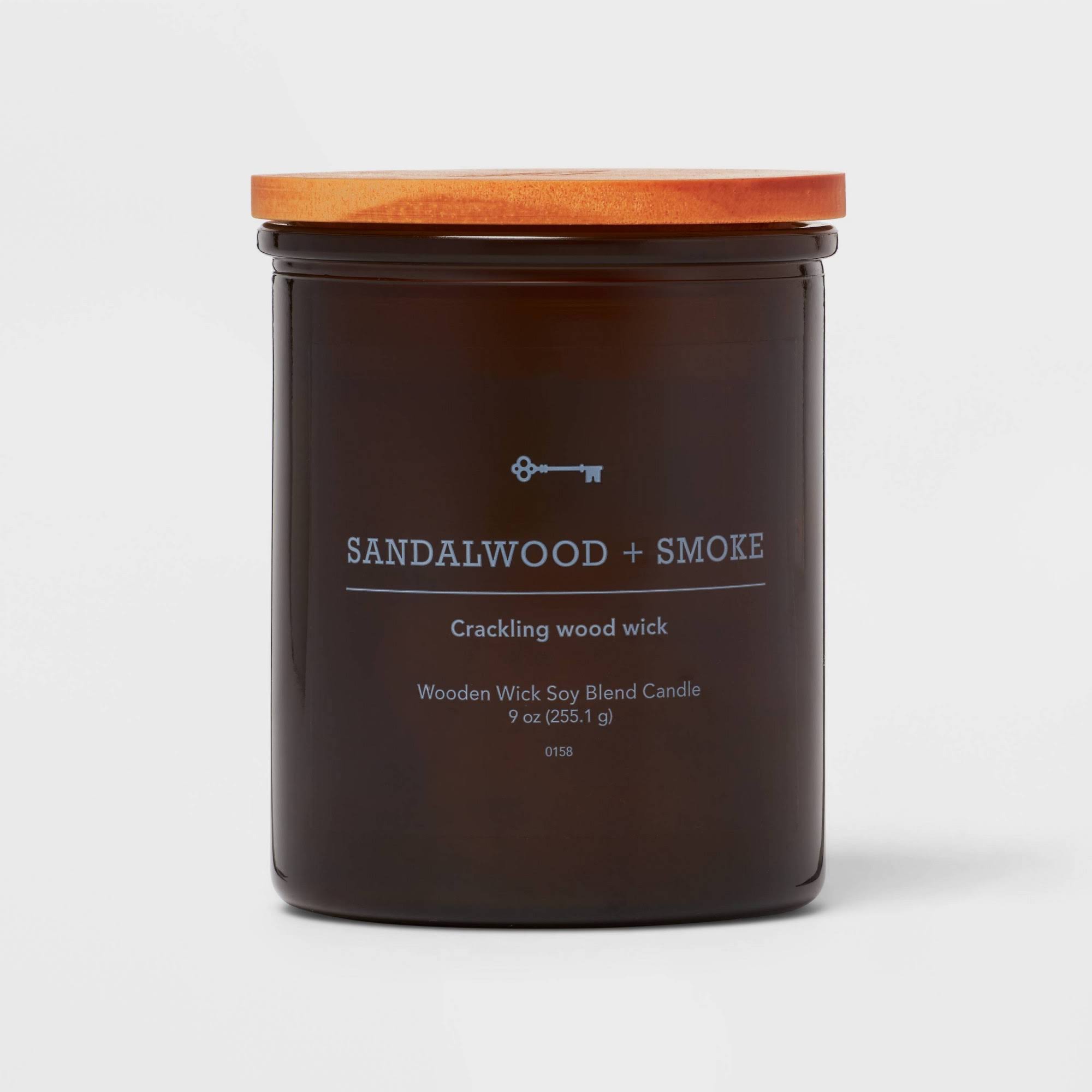 Threshold Lidded Amber Glass Jar Crackling Wooden Wick Sandalwood and Smoke Candle (9 oz) | Target