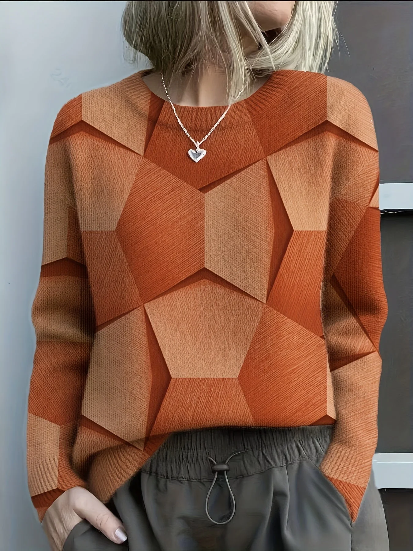 Sweat-shirt en maille confortable avec des imprimés géométriques 3D audacieux