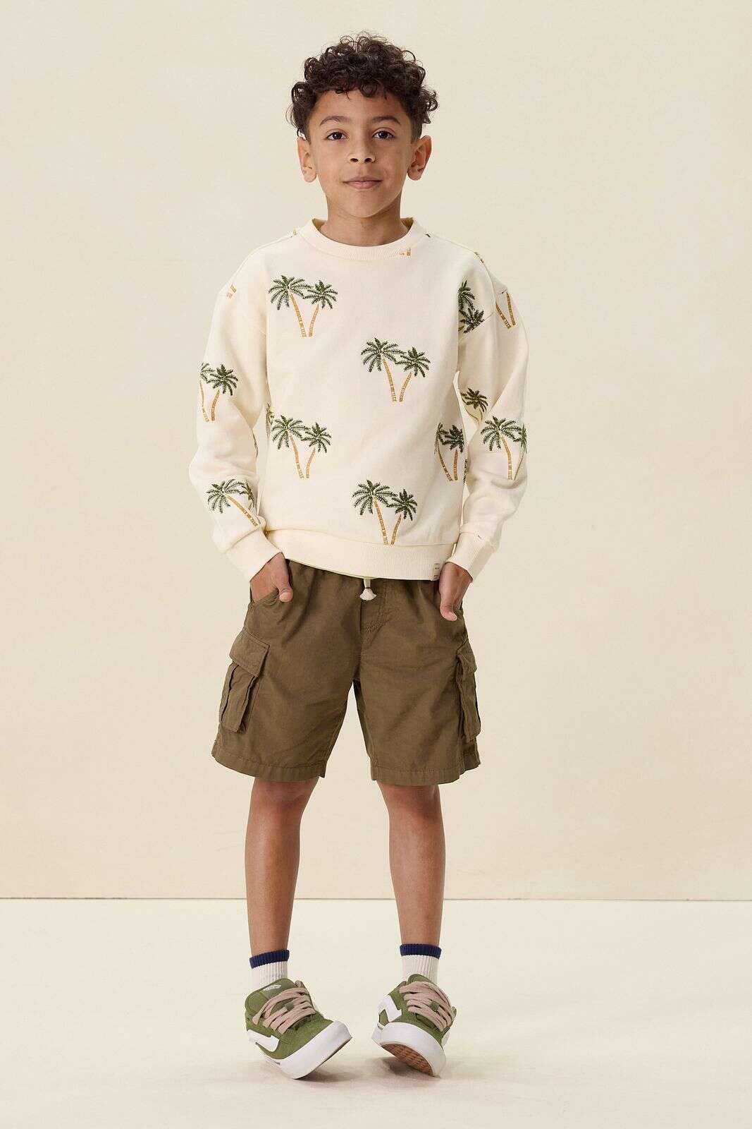 Witte sweater met palmboom
