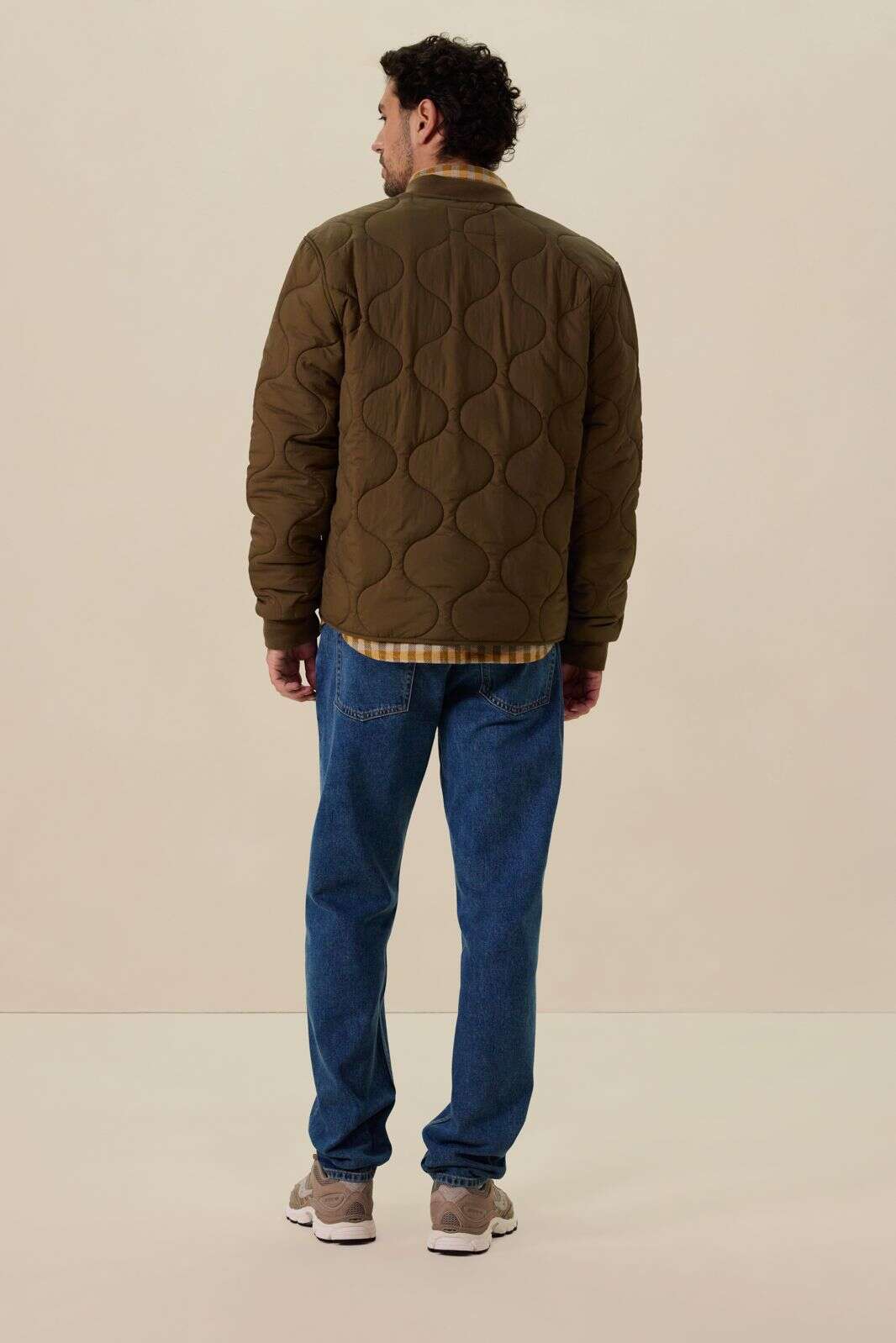Donkergroene quilted jas