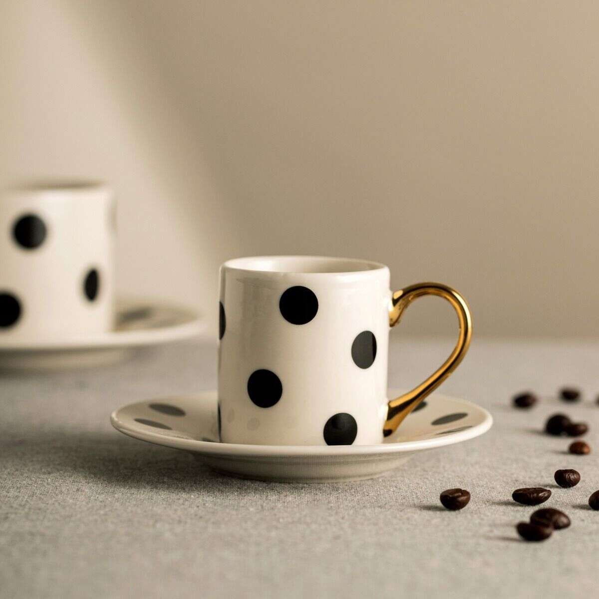 Filiżanka LUNYA ze spodkiem biała w czarne grochy 0,1 l