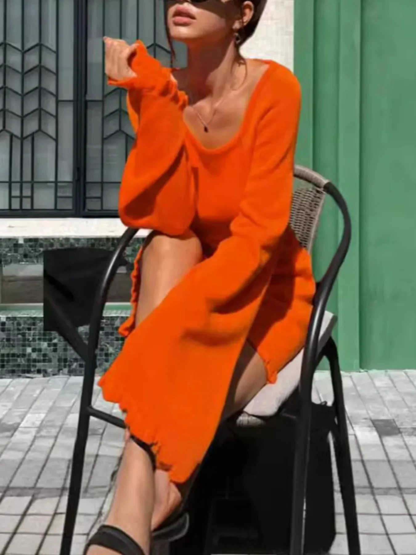 Robe pull en maille à manches longues et dos nu
