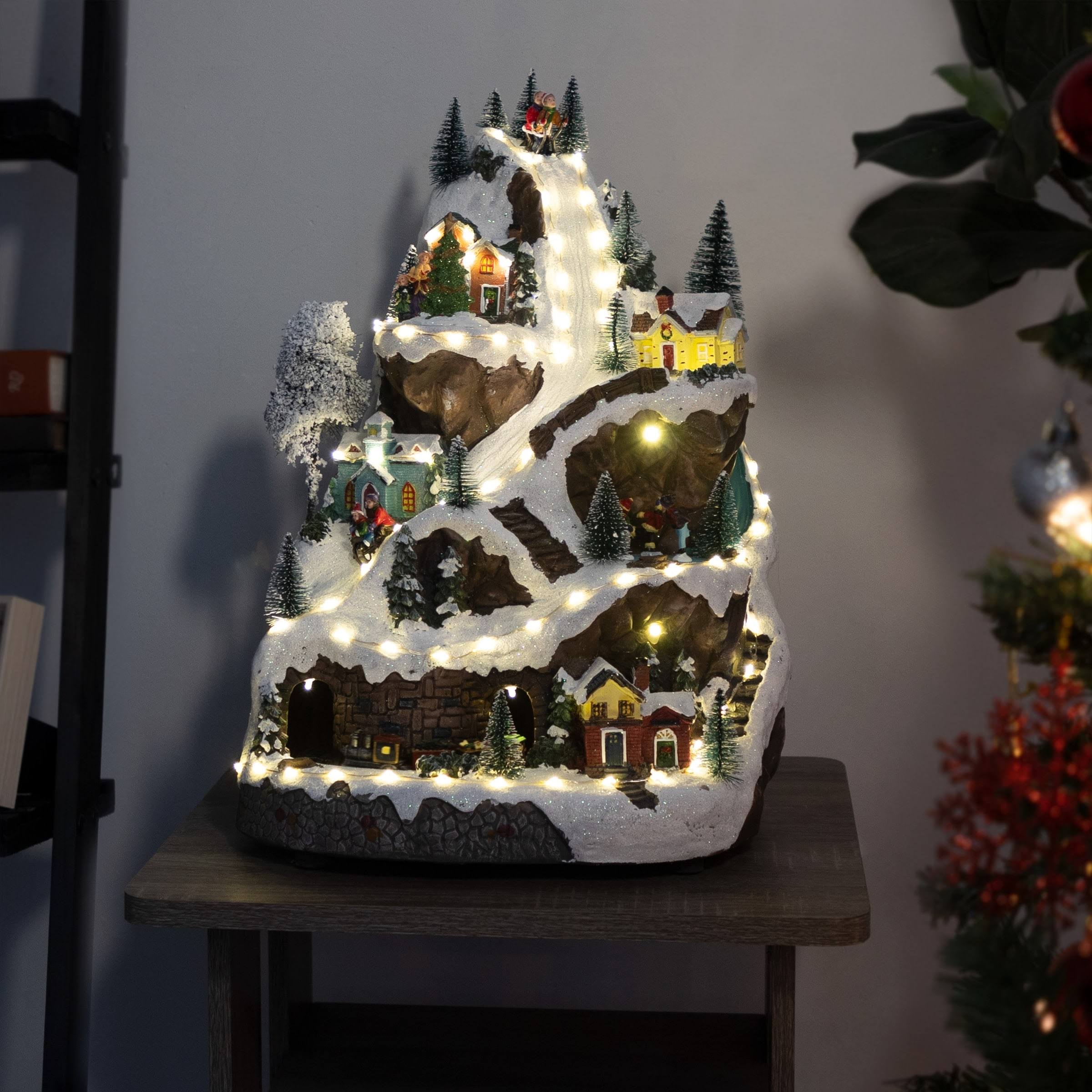Alpine Corporation 18 in. Tall Animated Winter Wonderland Set with LED Light and Music