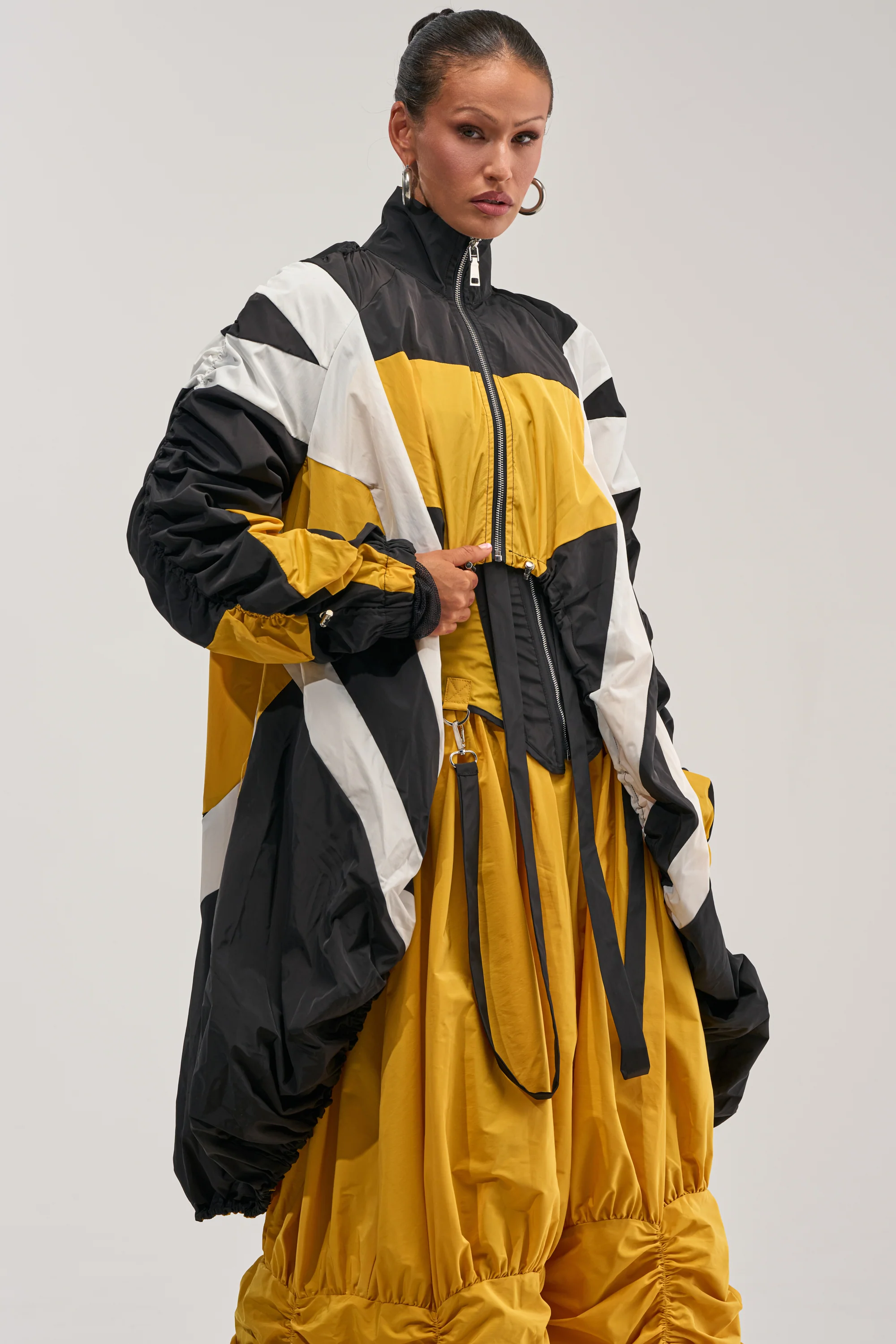 DON'T MIND ME HIGH LOW WINDBREAKER IN YELLOW - Akira Store