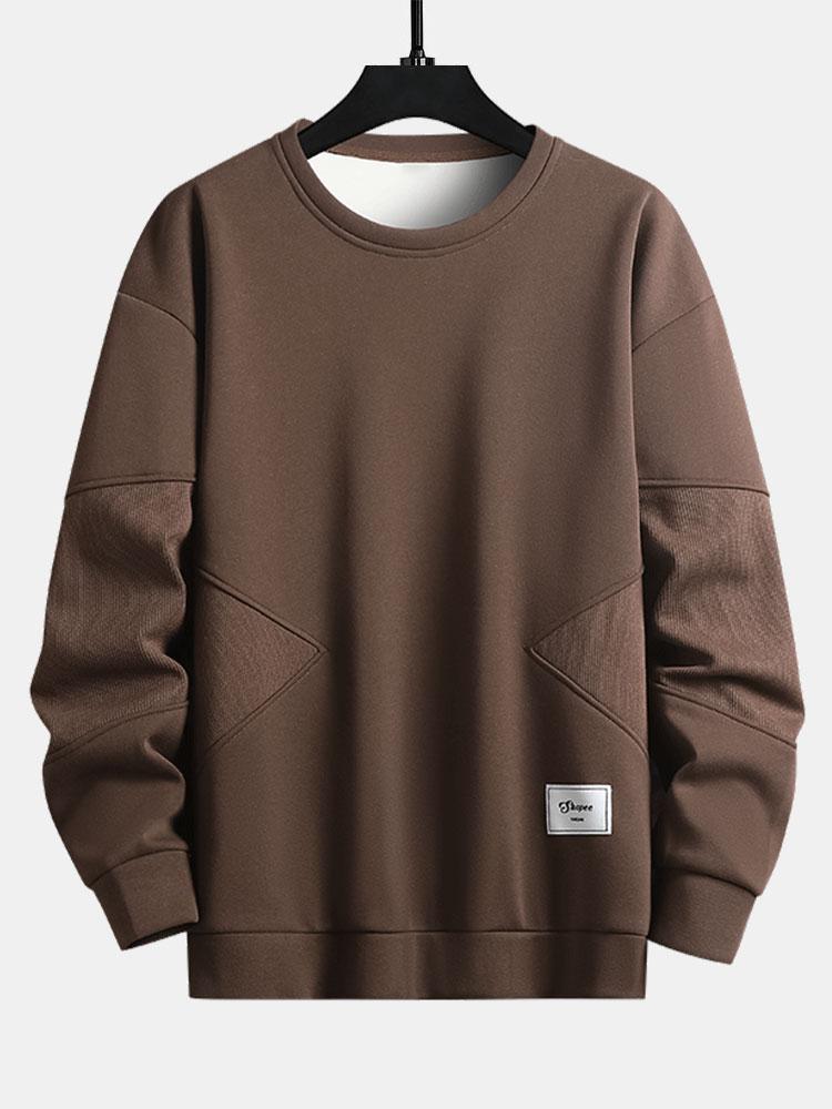Sweat-shirt à col rond en patchwork de tissu texturé