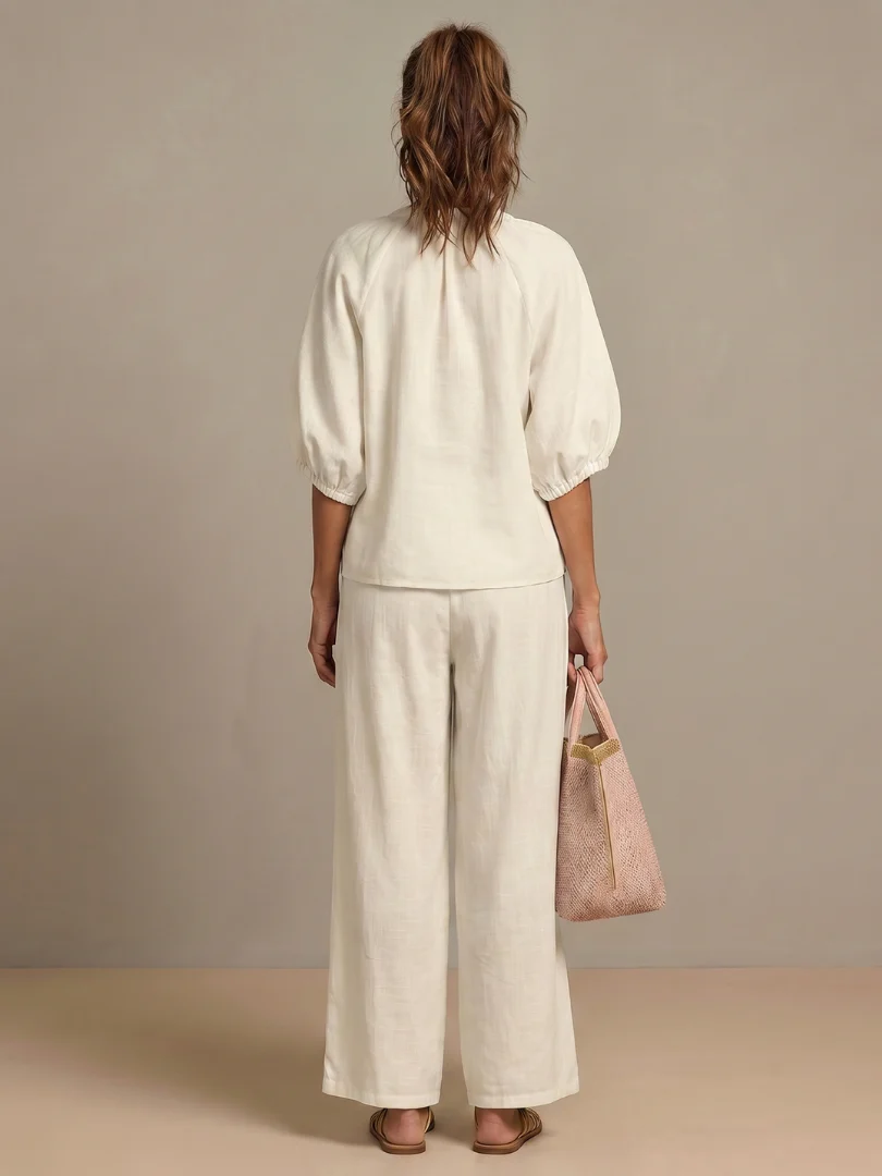 Ensemble blouse zippée et pantalon à jambes larges pour femme