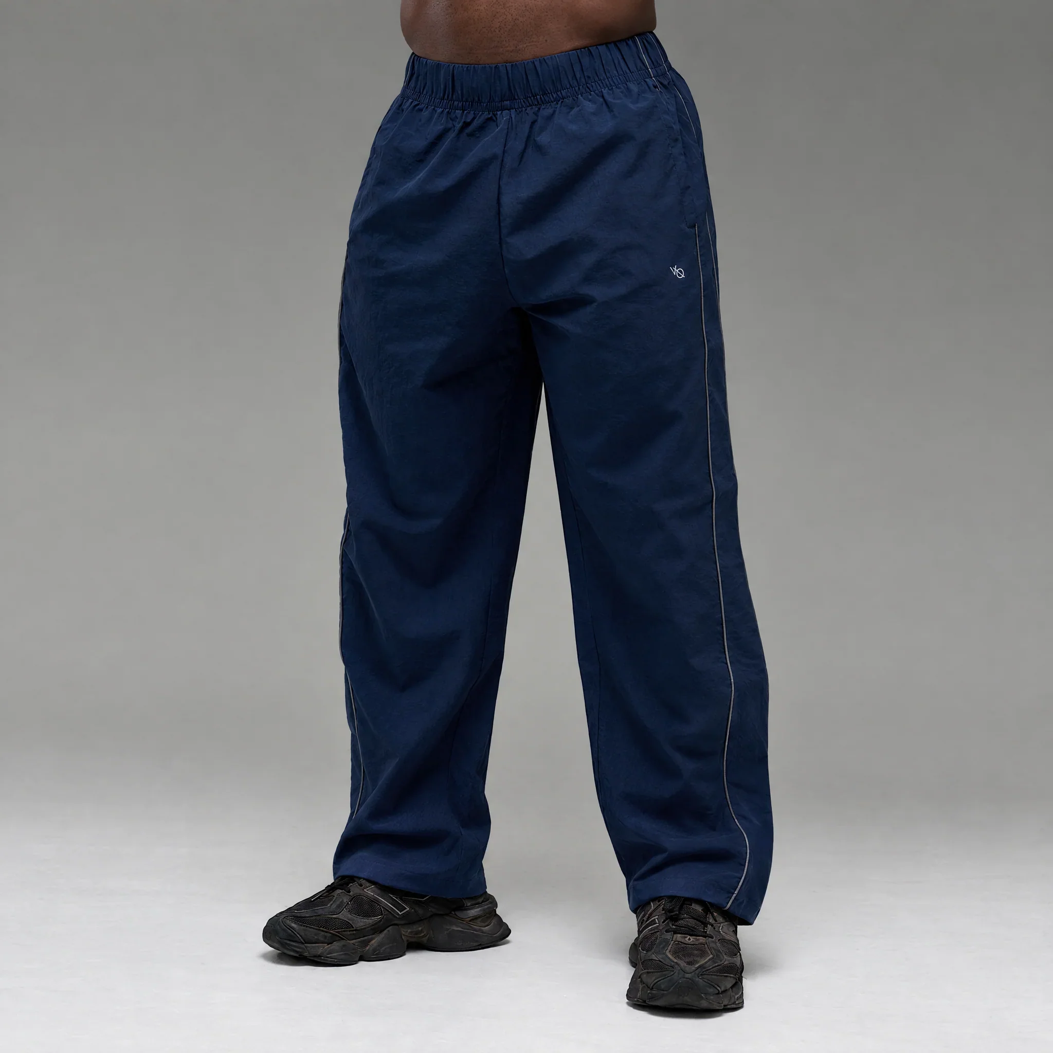 REFLECTIVE NAVY OVERSIZED TRACK PANTS