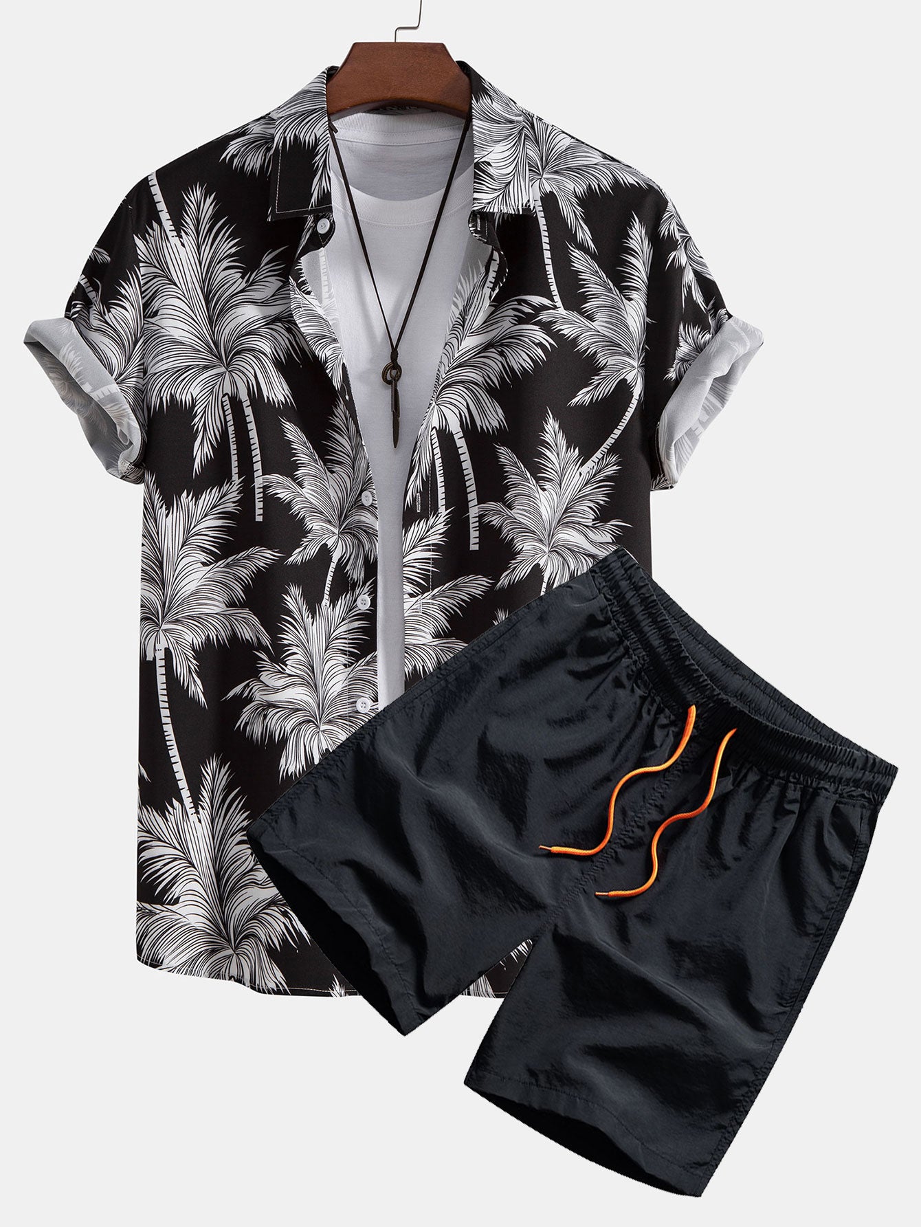 Chemise boutonnée à imprimé palmiers et short de bain